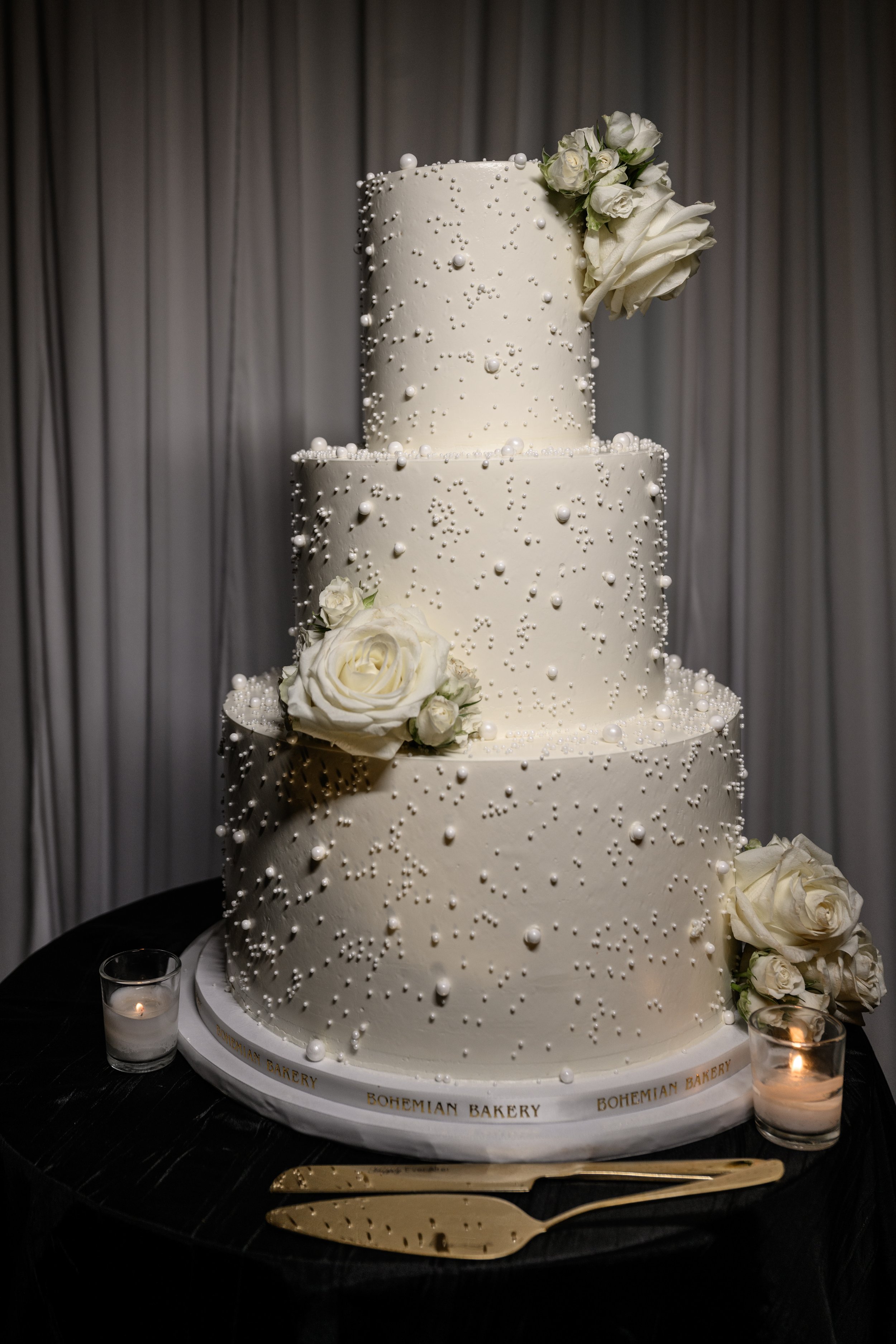 White floral wedding cake at Jalisa and Sadiq's reception