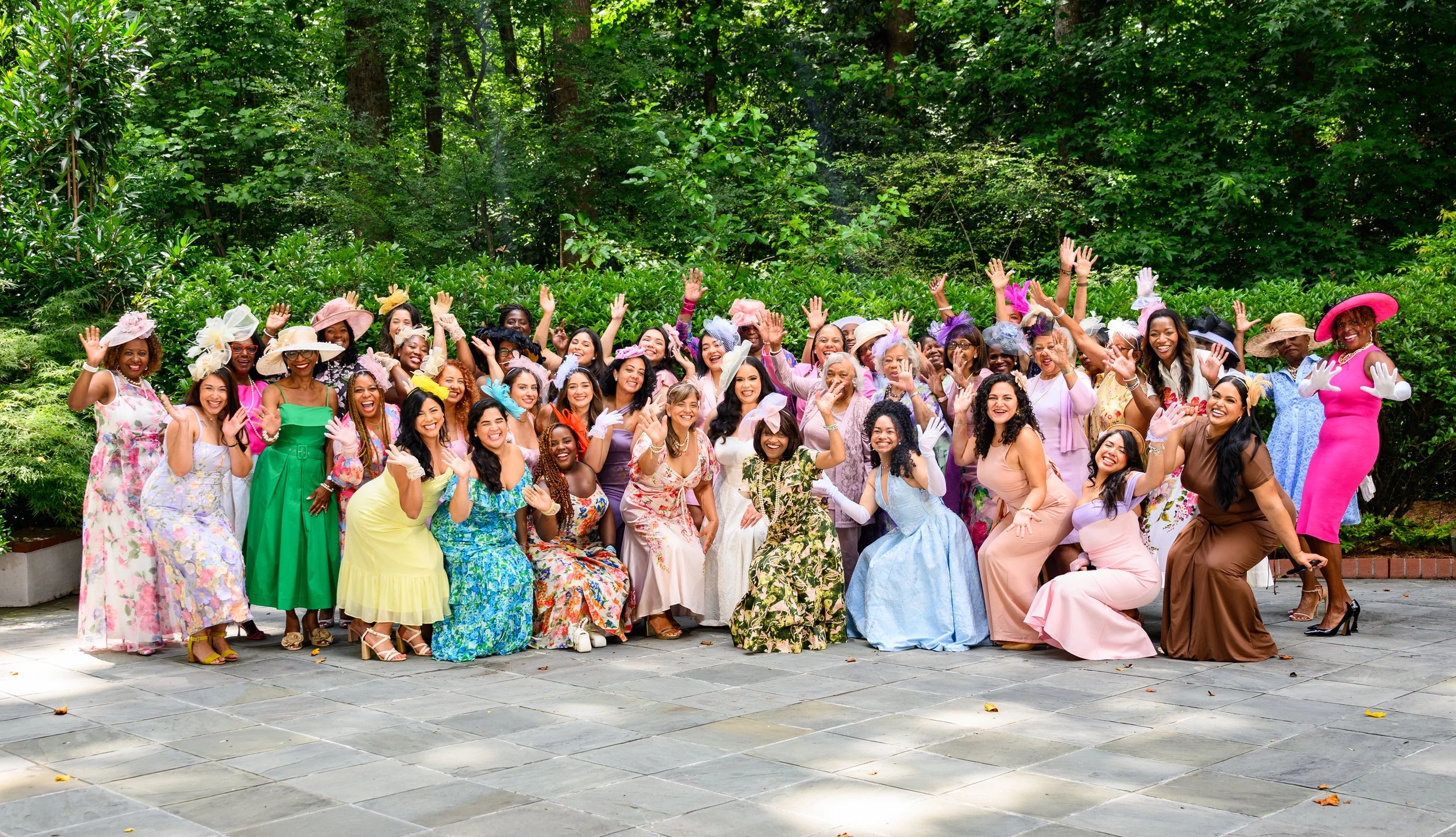Large group of guests celebrating together at an outdoor special event in Atlanta, photographed by Crystal Artis Photography.