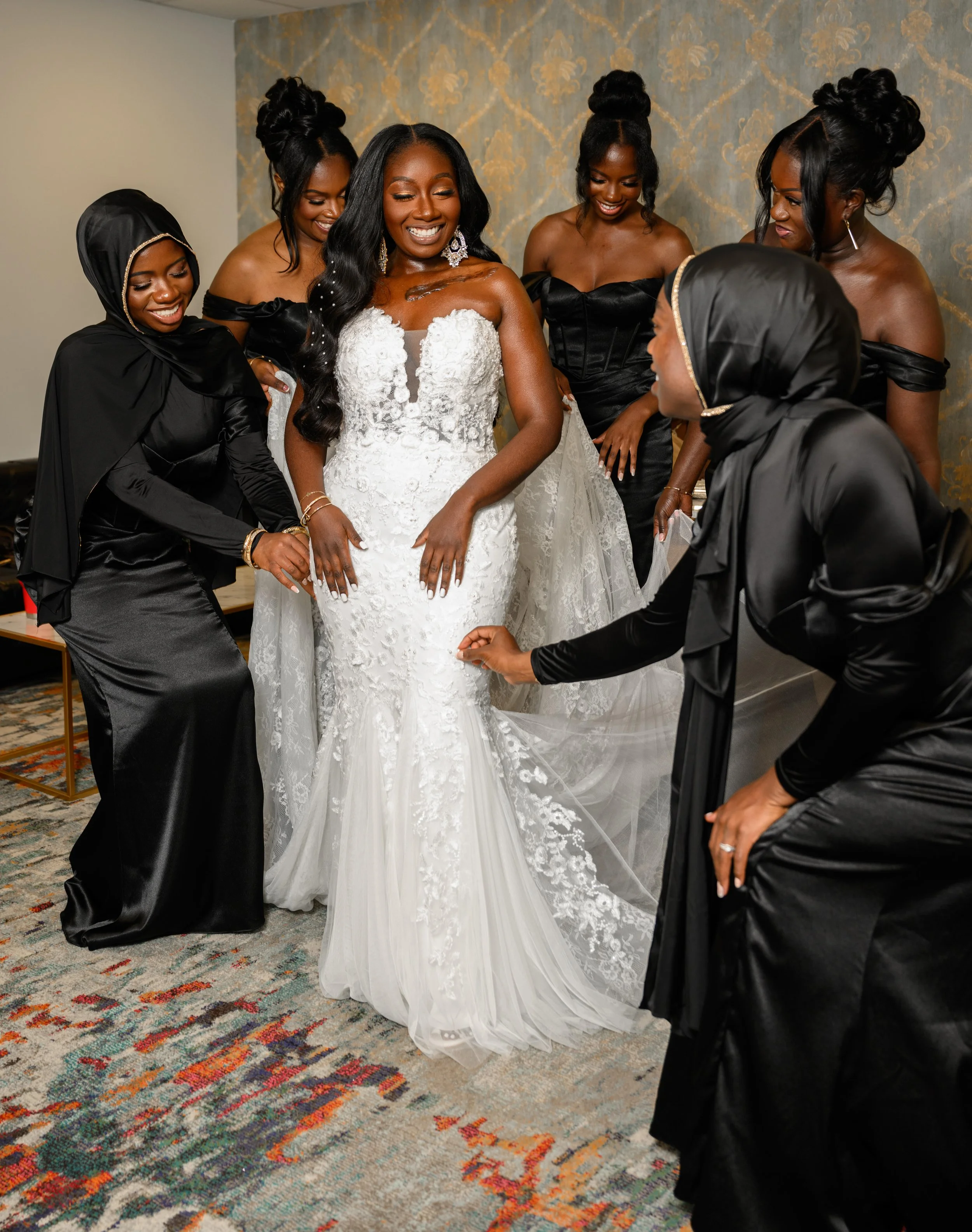 Jalisa celebrating with her bridesmaids on her wedding day