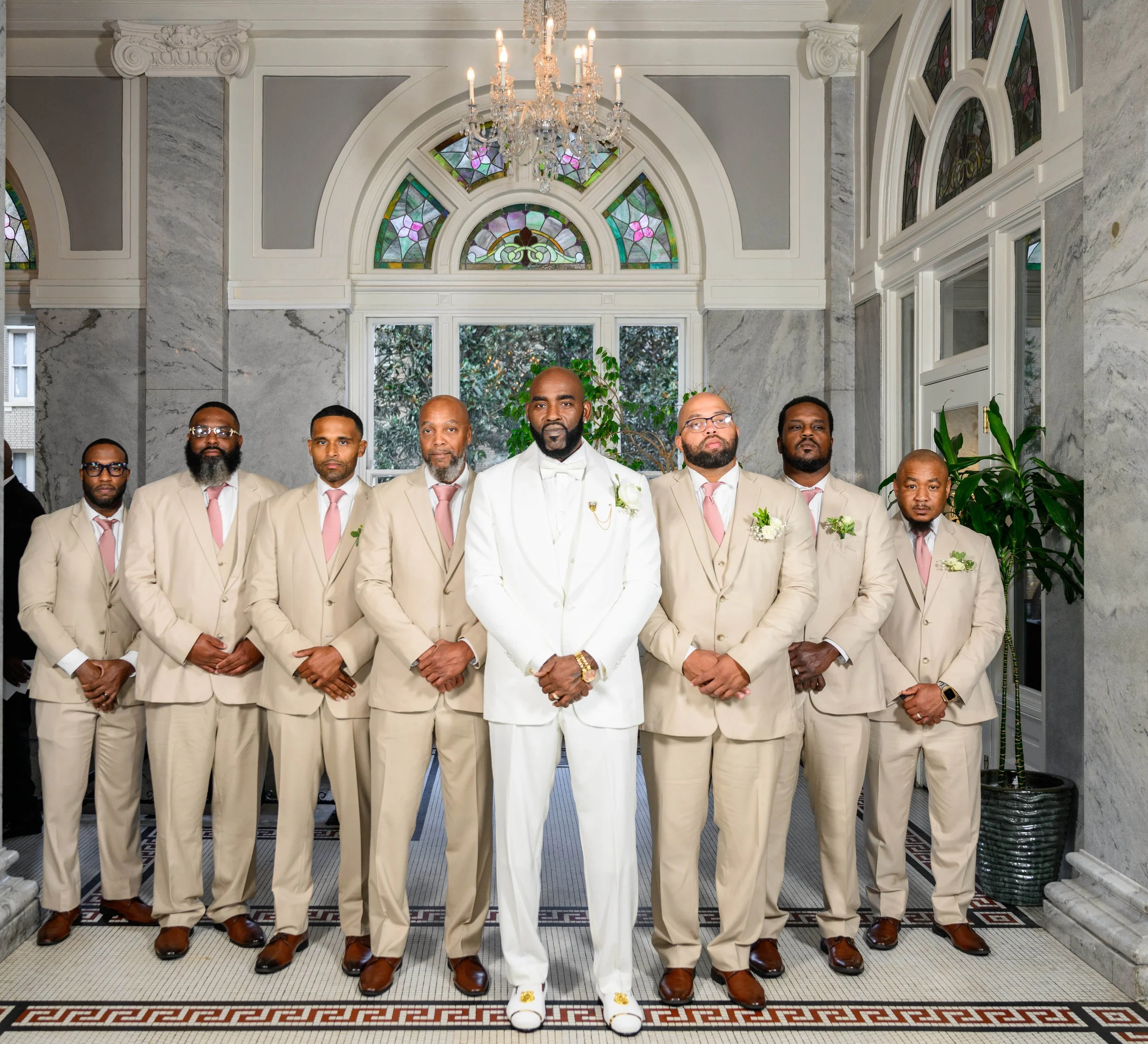 Groom with his groomsmen on his wedding day at Georgian Hall in Athens.