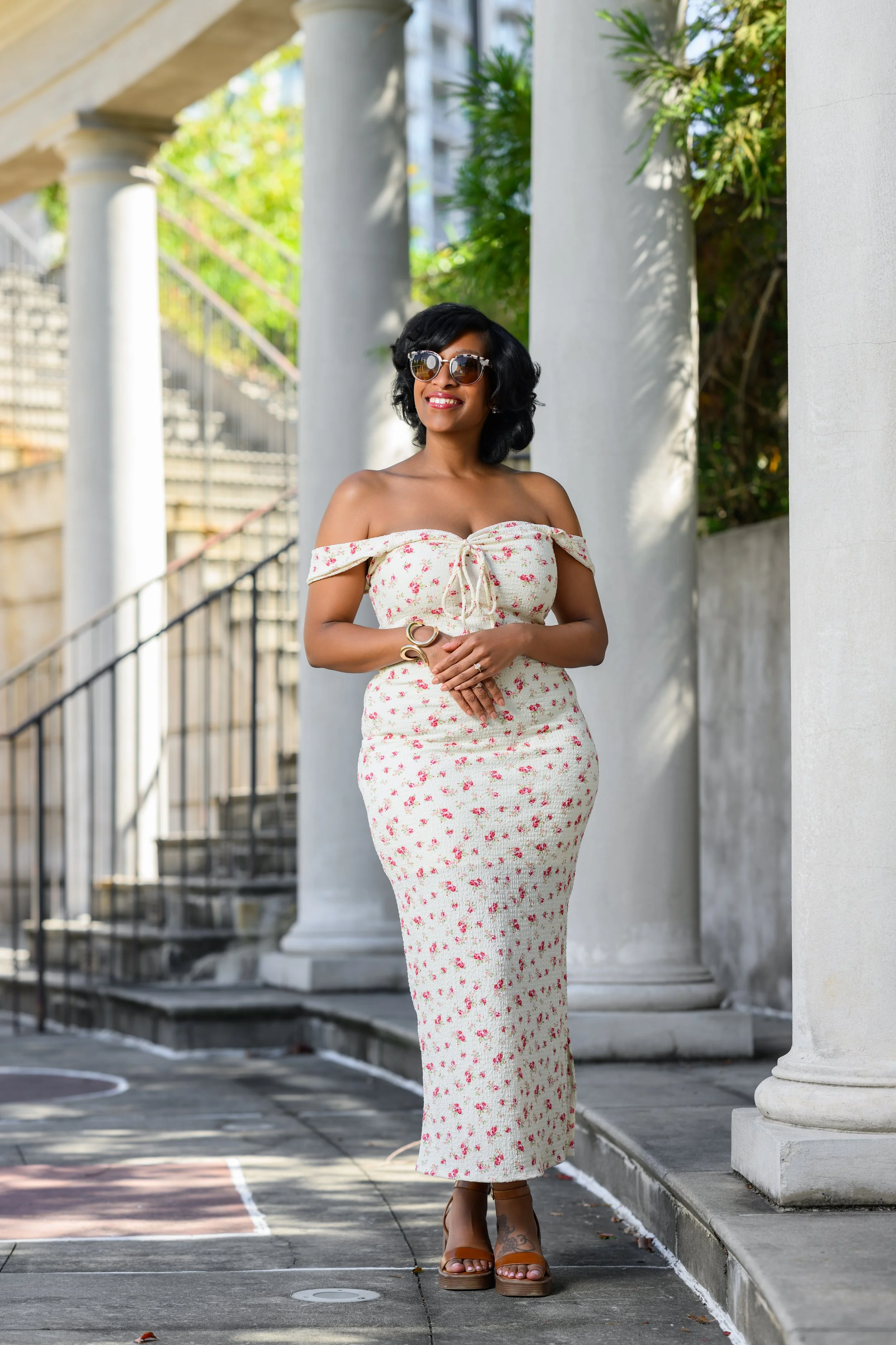 Bride-to-be posing between the columns at Millennium Gate Museum during an Atlanta engagement session.