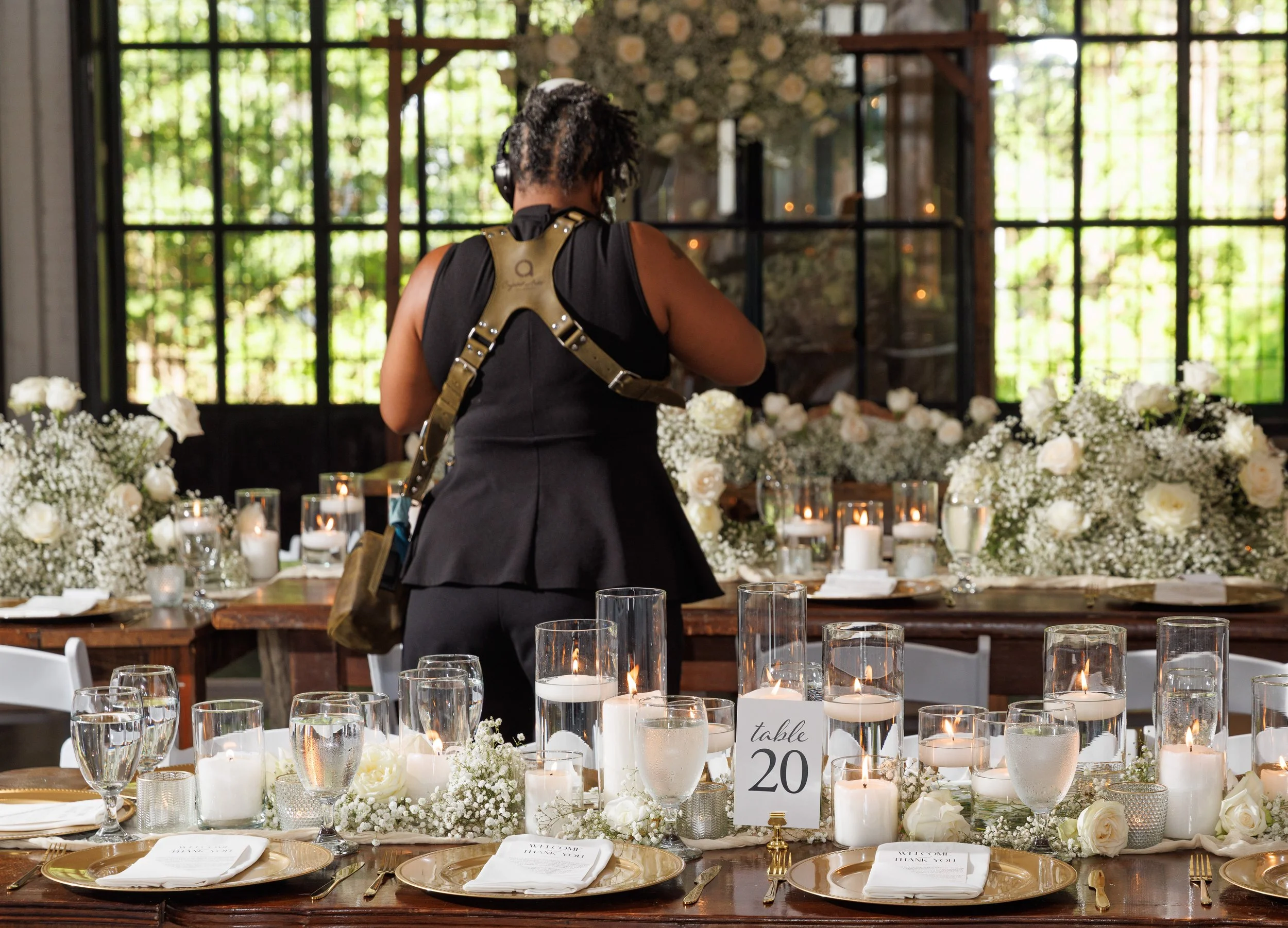 Atlanta wedding photographer Crystal Artis photographing reception details during a wedding.