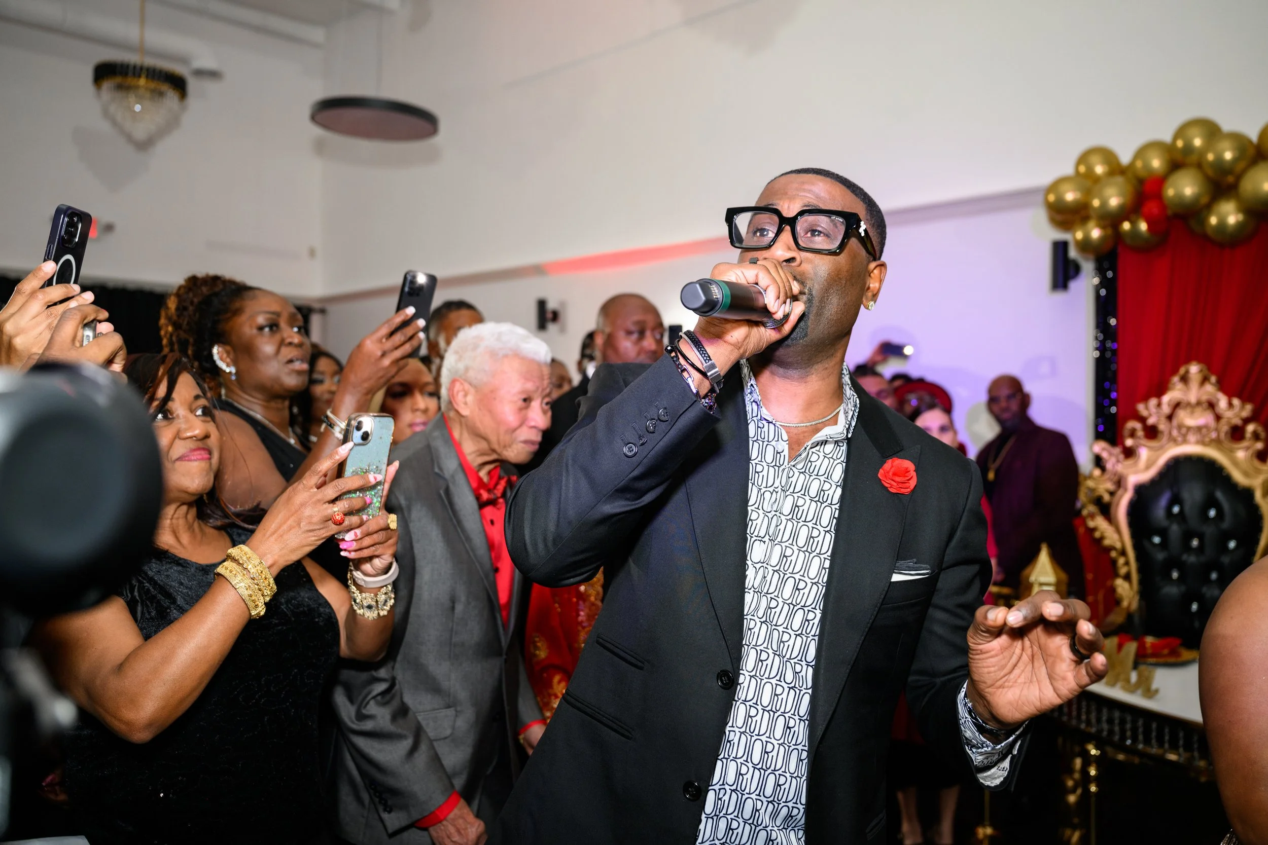 Q Parker of R&B group 112 performing for guests during Warren’s 50th birthday celebration in Atlanta.