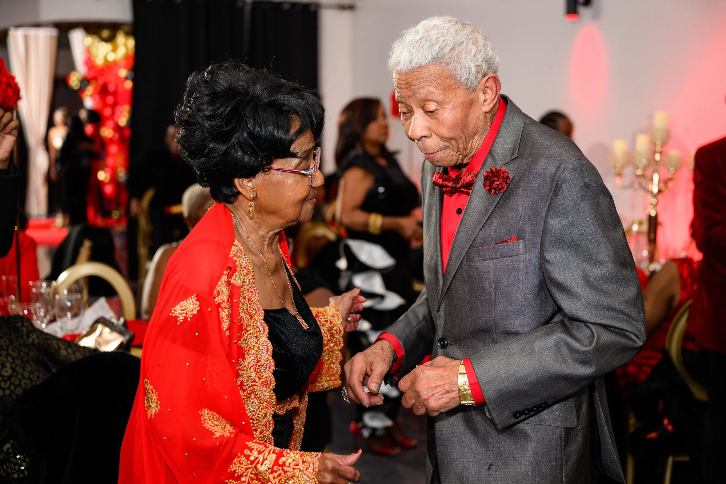 Guests sharing a joyful dance during Warren’s milestone 50th birthday celebration in Atlanta.