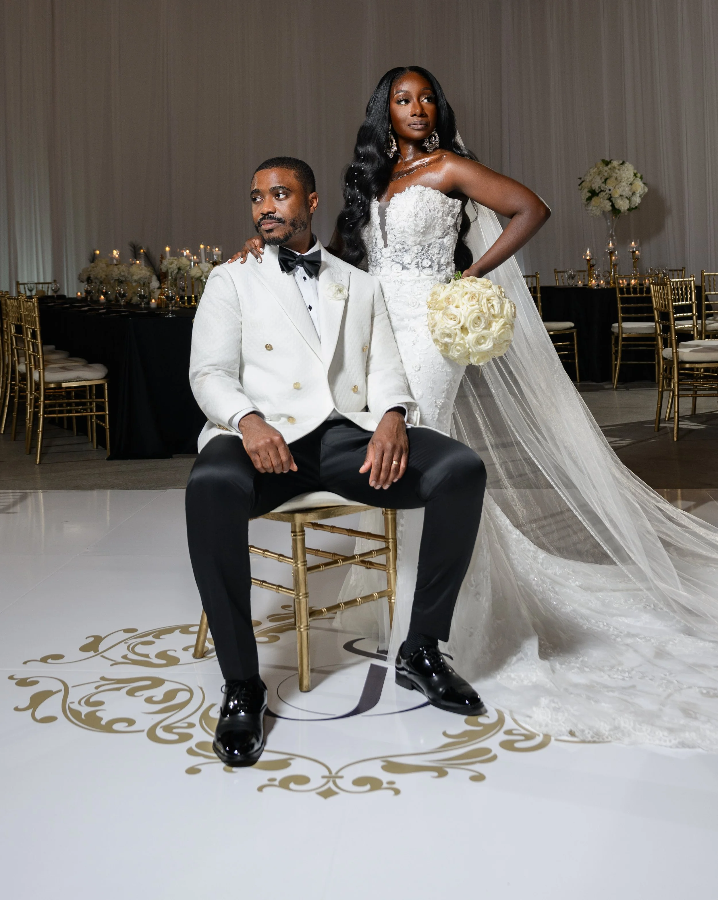 Jalisa standing beside Sadiq for an editorial reception portrait