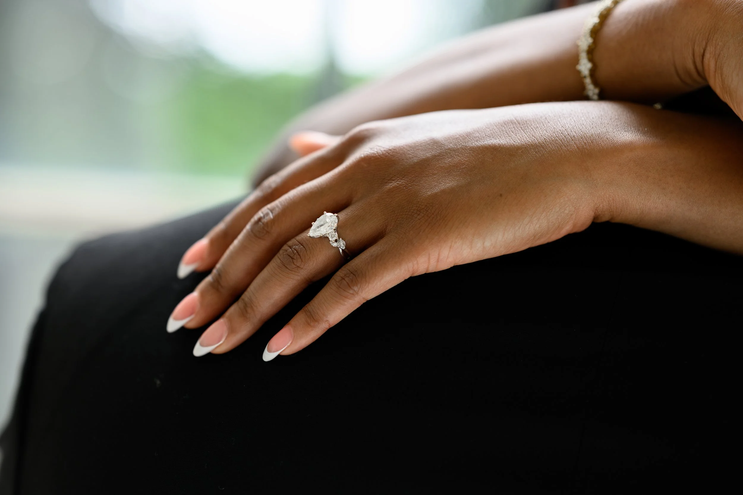 Close-up of Denea's engagement ring during her engagement session with Chris in Atlanta.