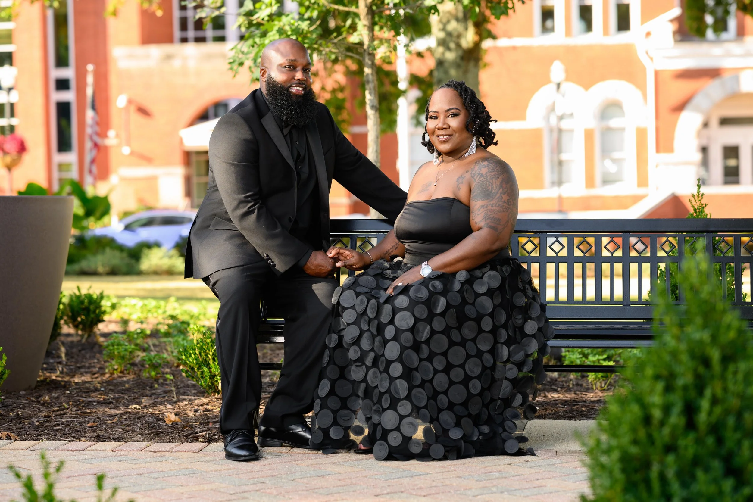 Couple posing during a portrait session in downtown McDonough, Georgia