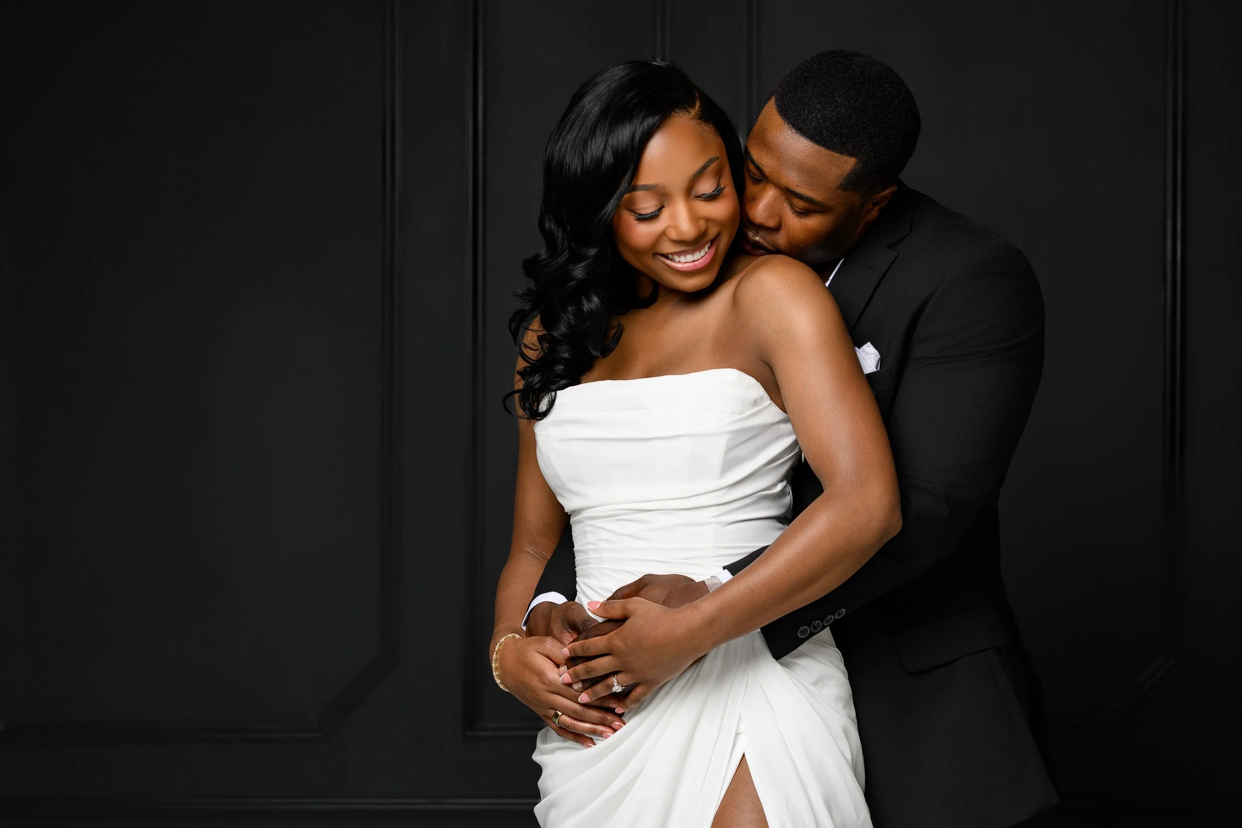 Intimate portrait of Denea and Chris during their engagement session at Atlanta BeltLine Studio.