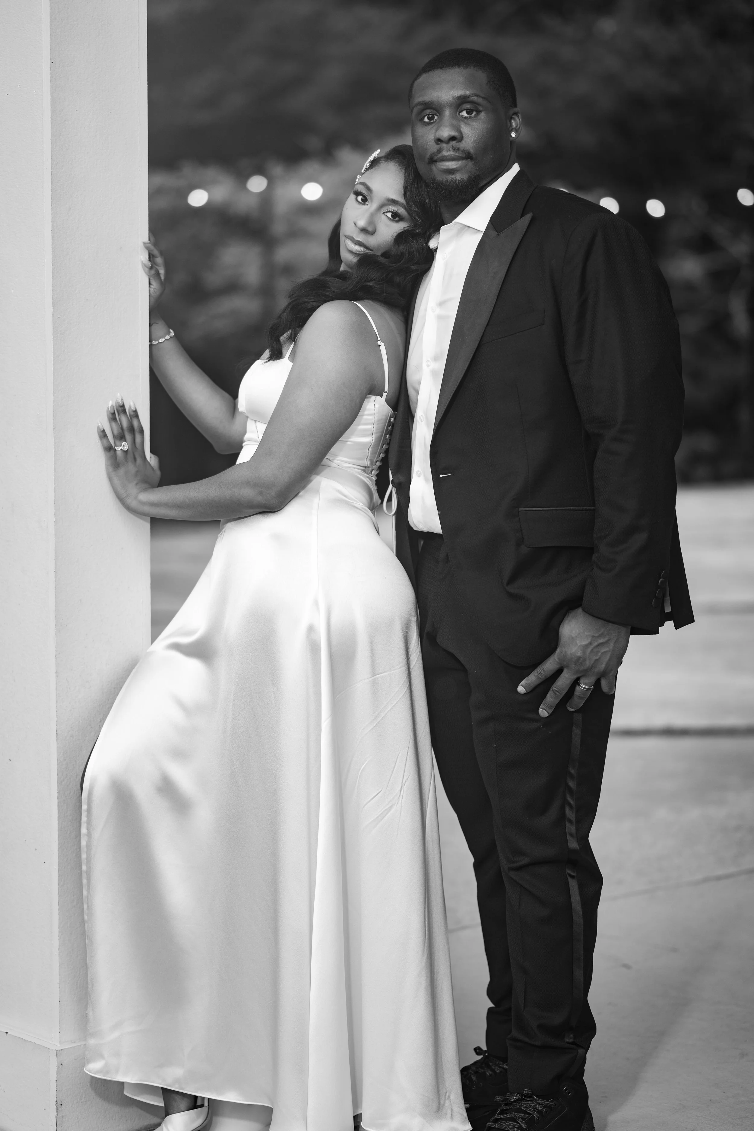 Newlywed couple posing together in their reception attire at The Venue at Daisy Hill.