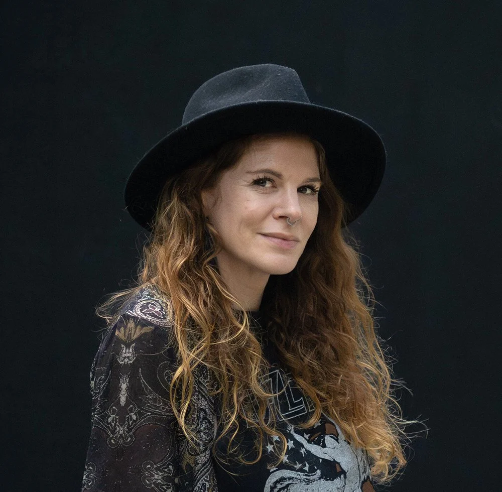 Somatic coach, Vix Anderton, looking friendly at the camera