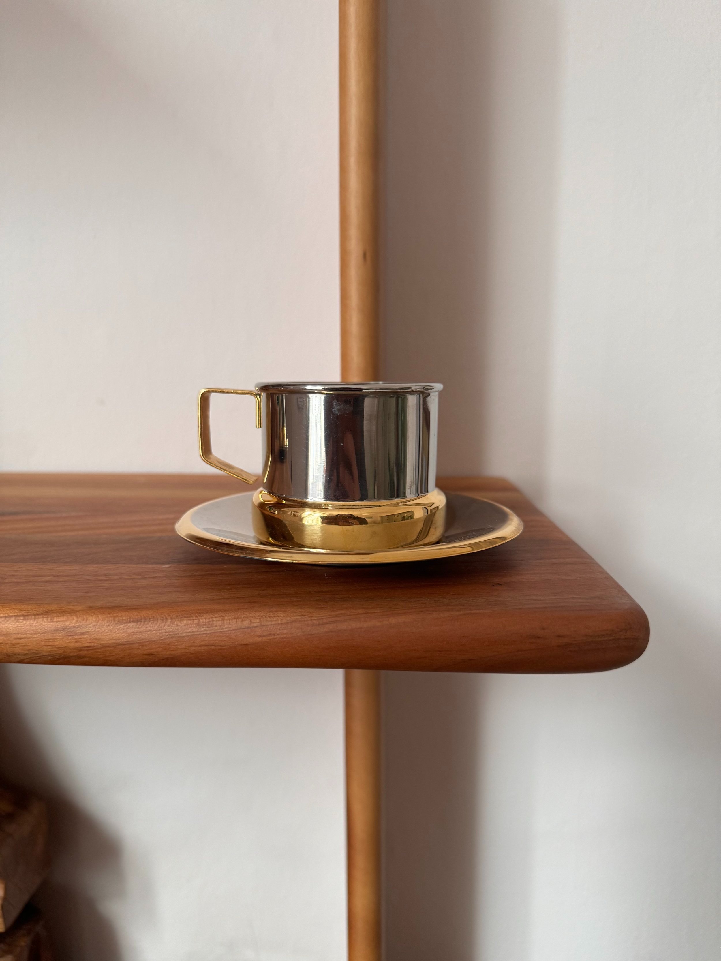 Vintage stainless steel and gold espresso cup and saucer