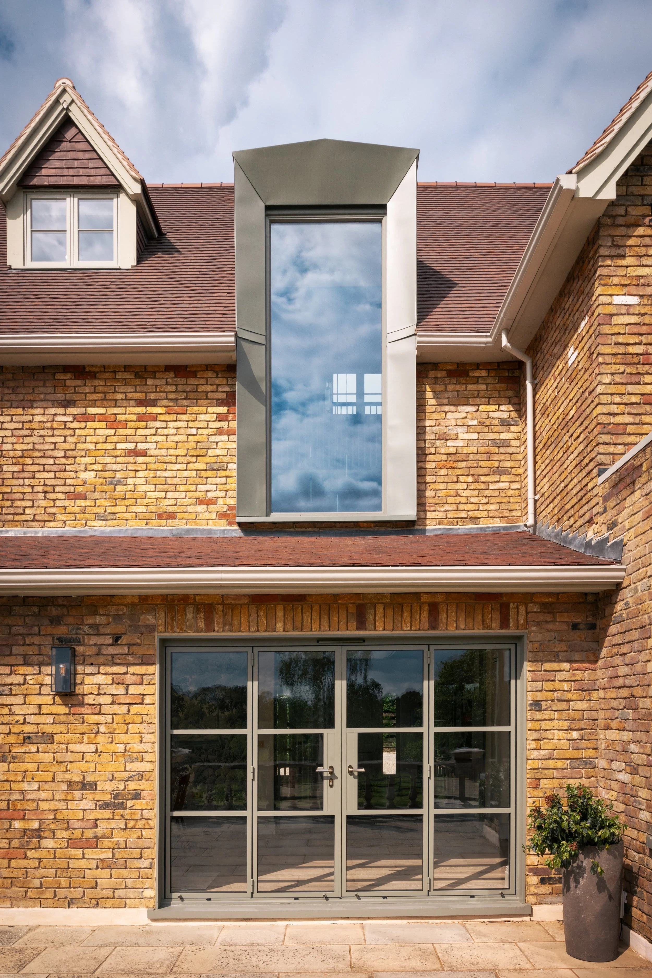 Exterior view of a transformed Hertfordshire country home designed by London architecture studio Studio Tashima.