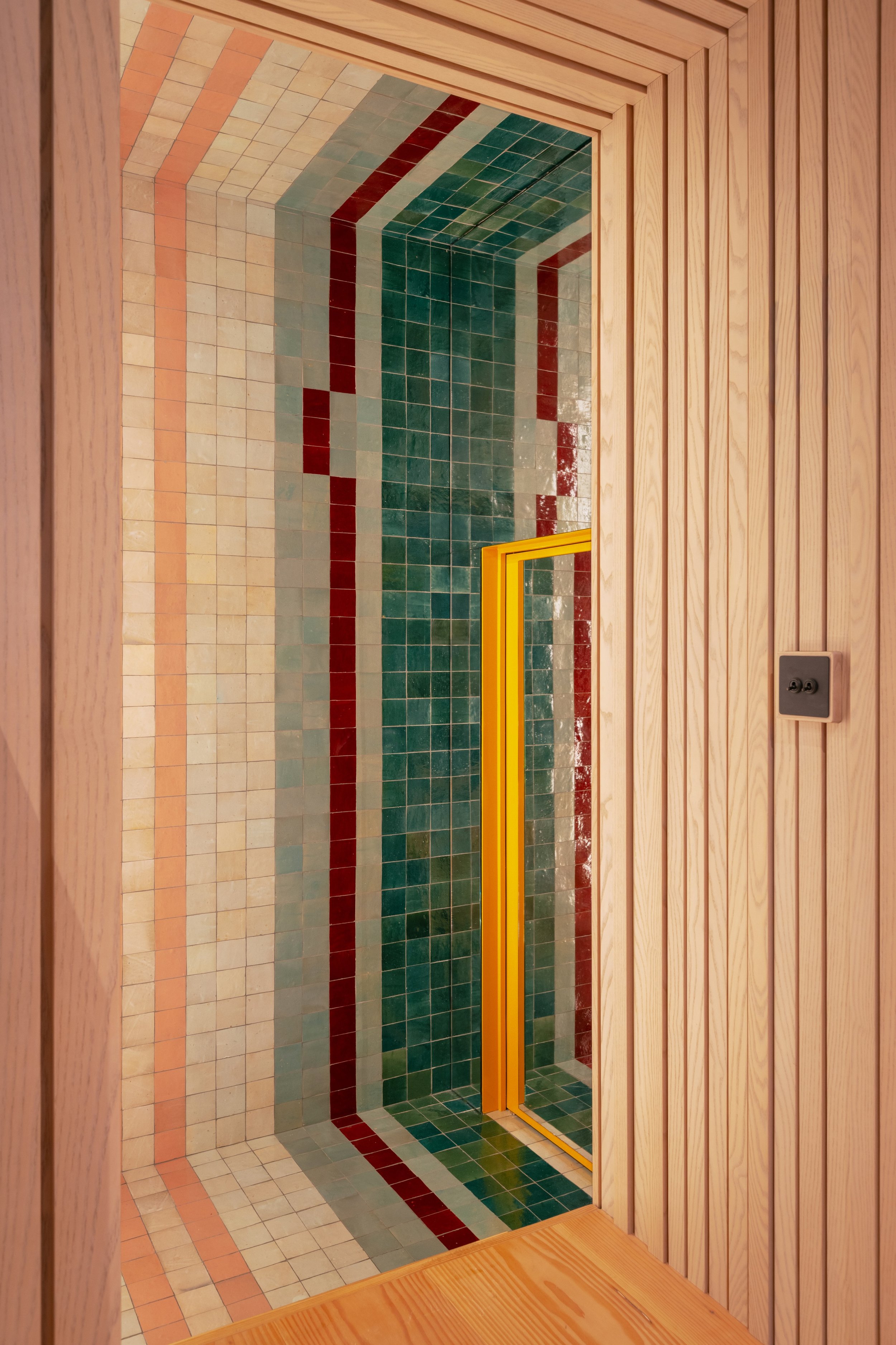 West London residential home by architecture and renovation studio Studio Tashima, showcasing a contemporary mirror hall design within a refurbished property