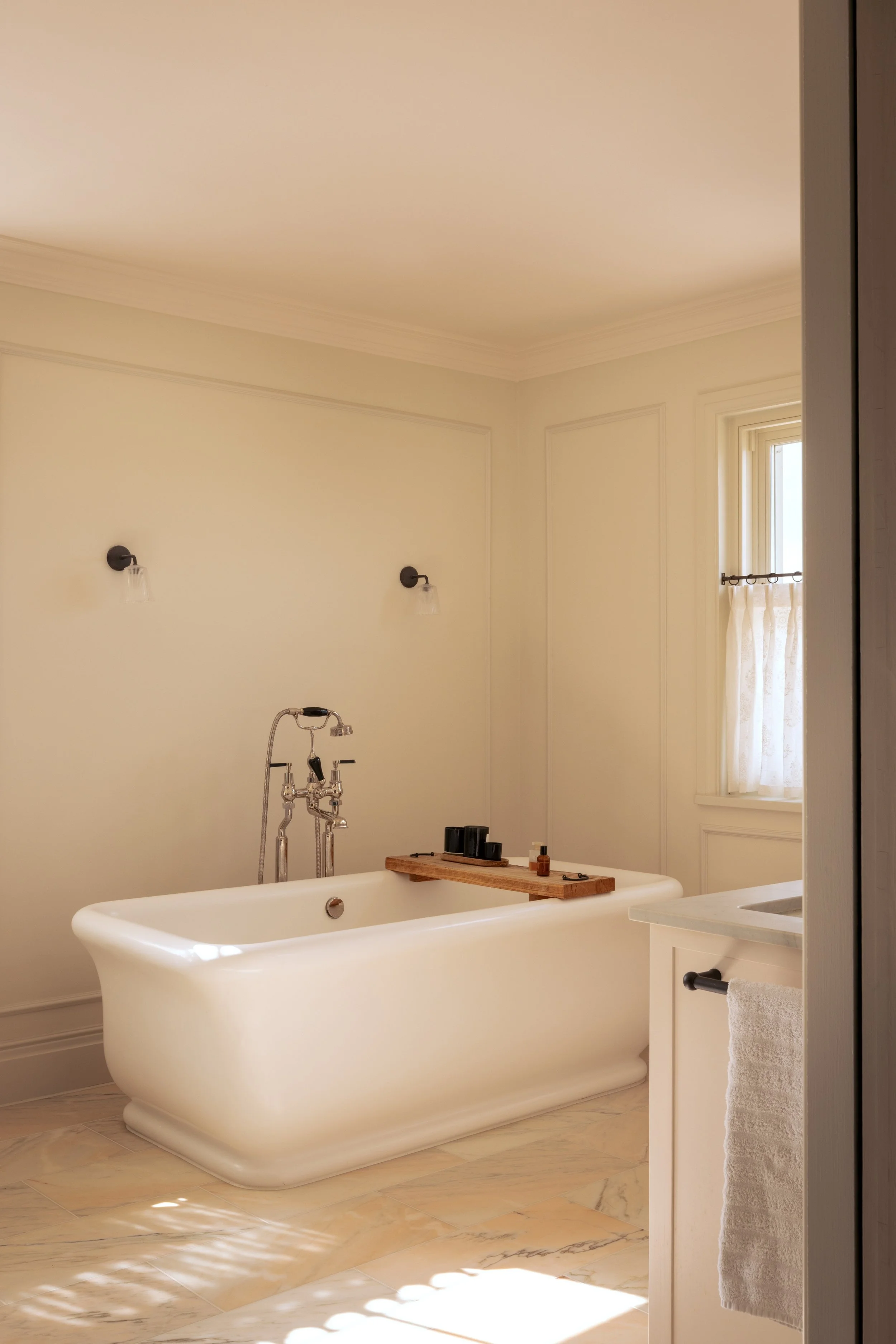Thoughtful bathroom architectural transformation of a family countryside home in the UK, retaining the existing 1980s building.