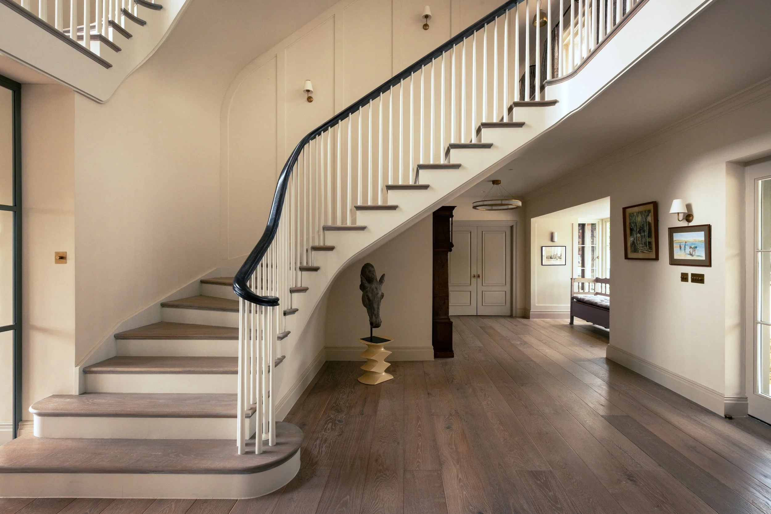 Architectural renovation and transformation of an existing country home, creating a contemporary family residence within the original structure.