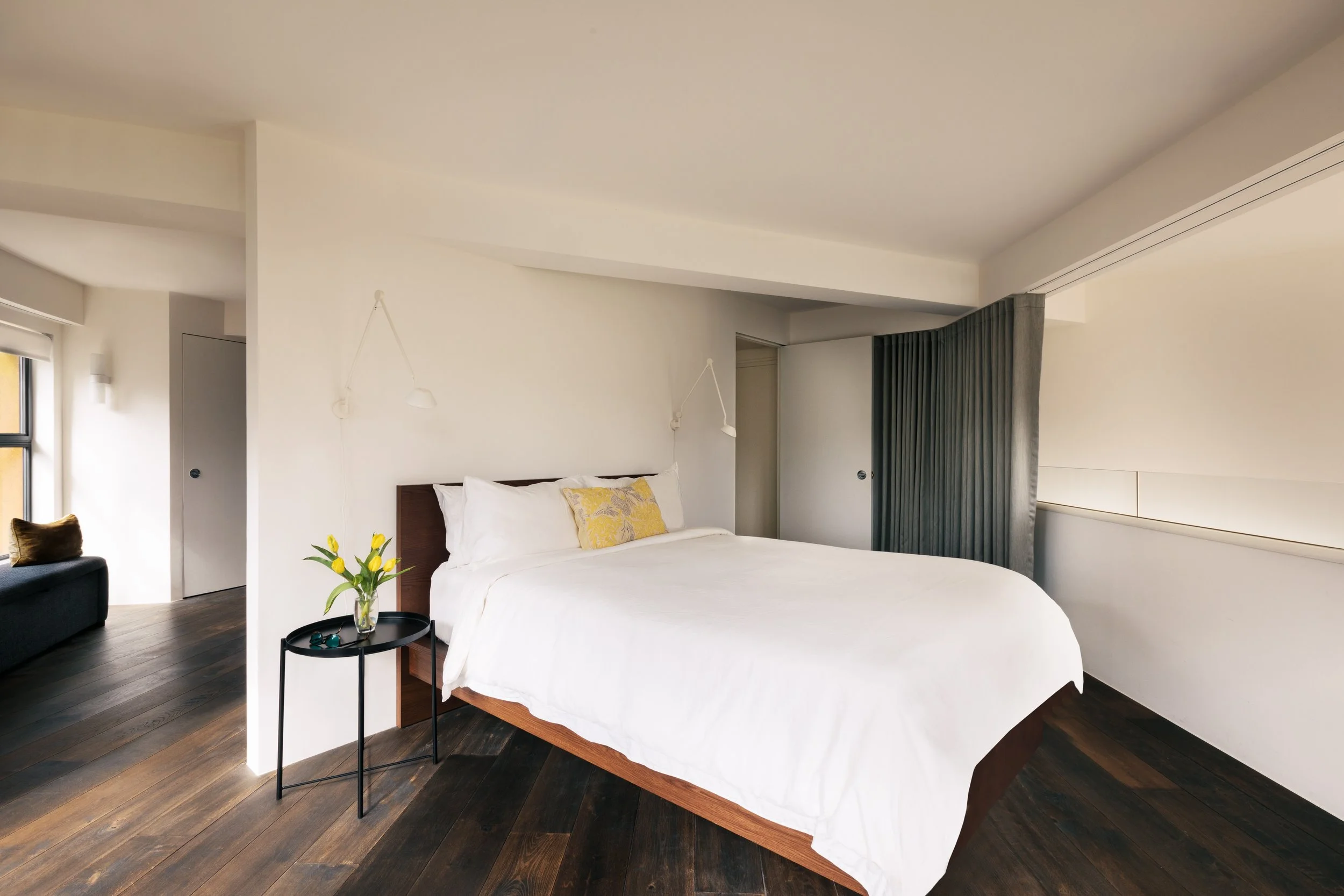 An elegant residential bedroom design in London by Studio Tashima, combining timeless style with contemporary architectural interiors.