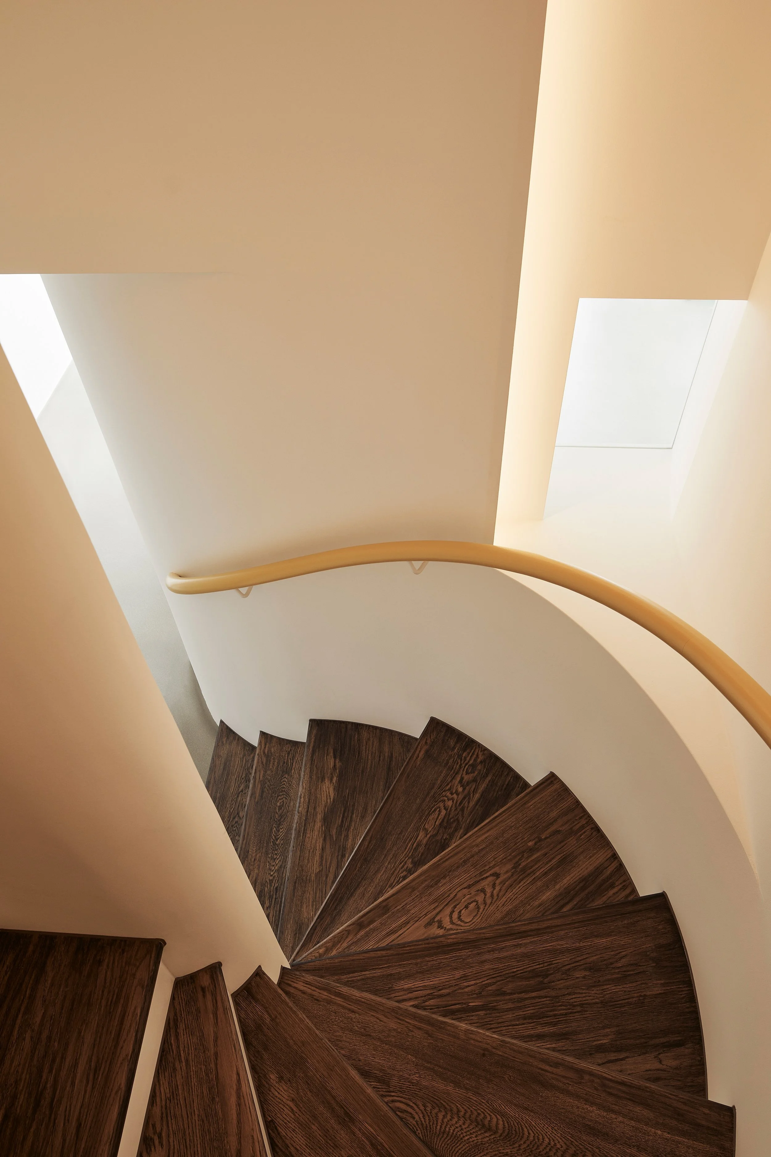 A modern staircase design within a London residential home by Studio Tashima, focusing on clean lines and contemporary architectural style.