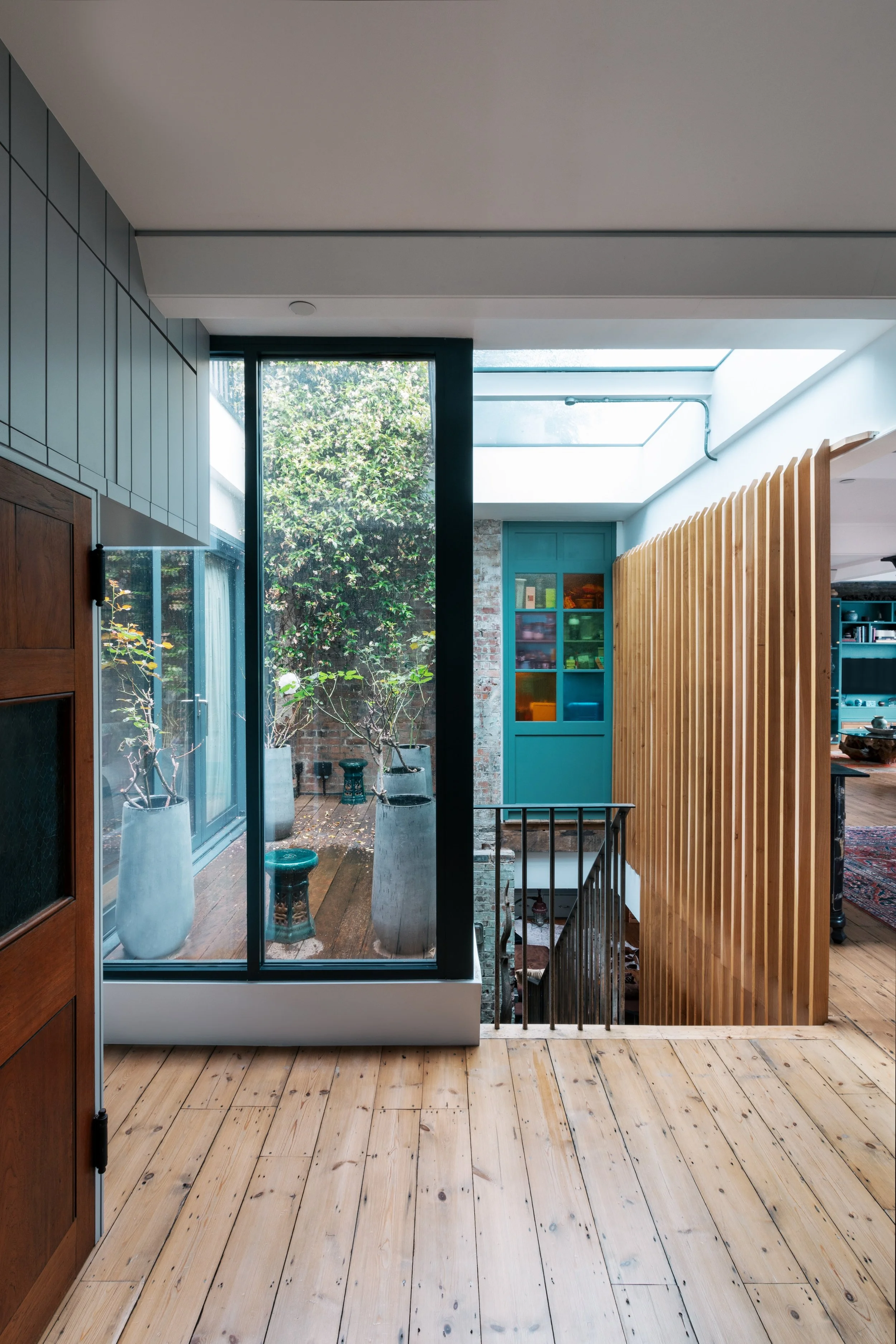 Building renovation services captured in a Brick Lane project combining contemporary architecture London with subtle detailing