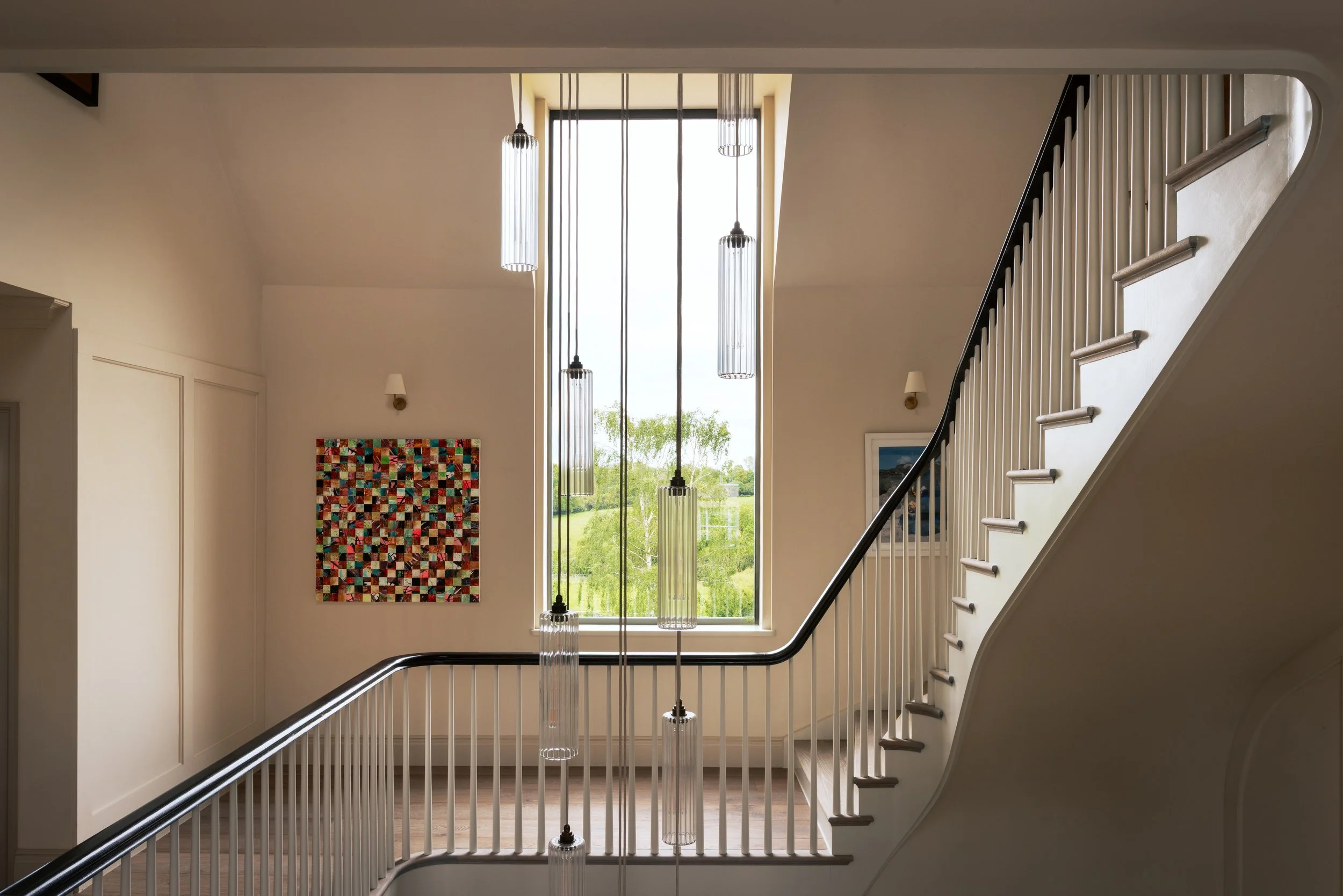 Contemporary transformation of a 1980s country home, retaining the original building rather than demolishing and rebuilding