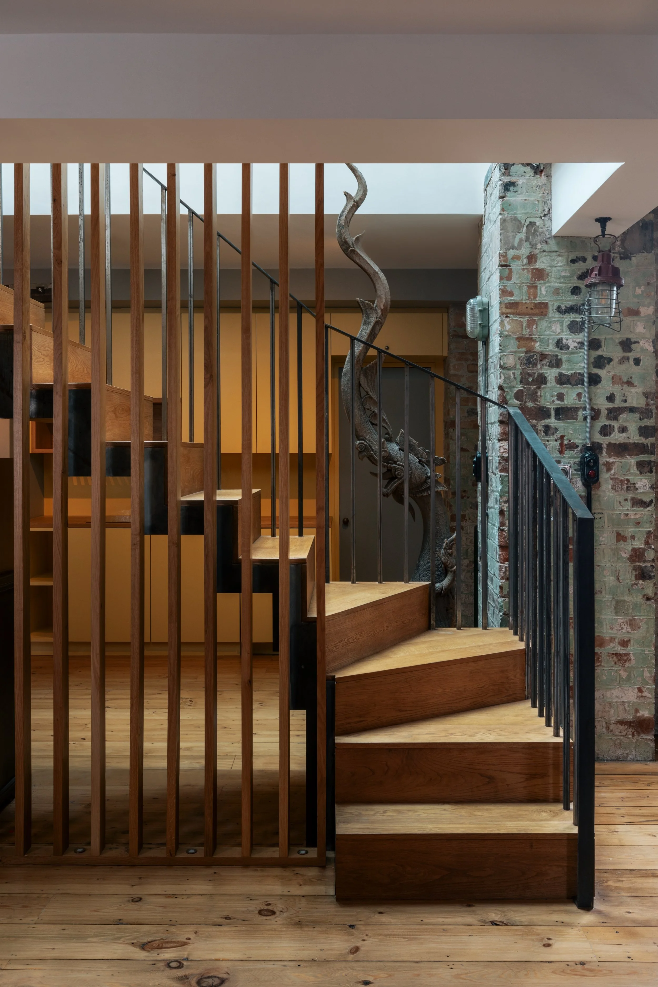 Staircase within a Brick Lane property refurbishment by Studio Tashima highlighting residential architecture services and precise detailing