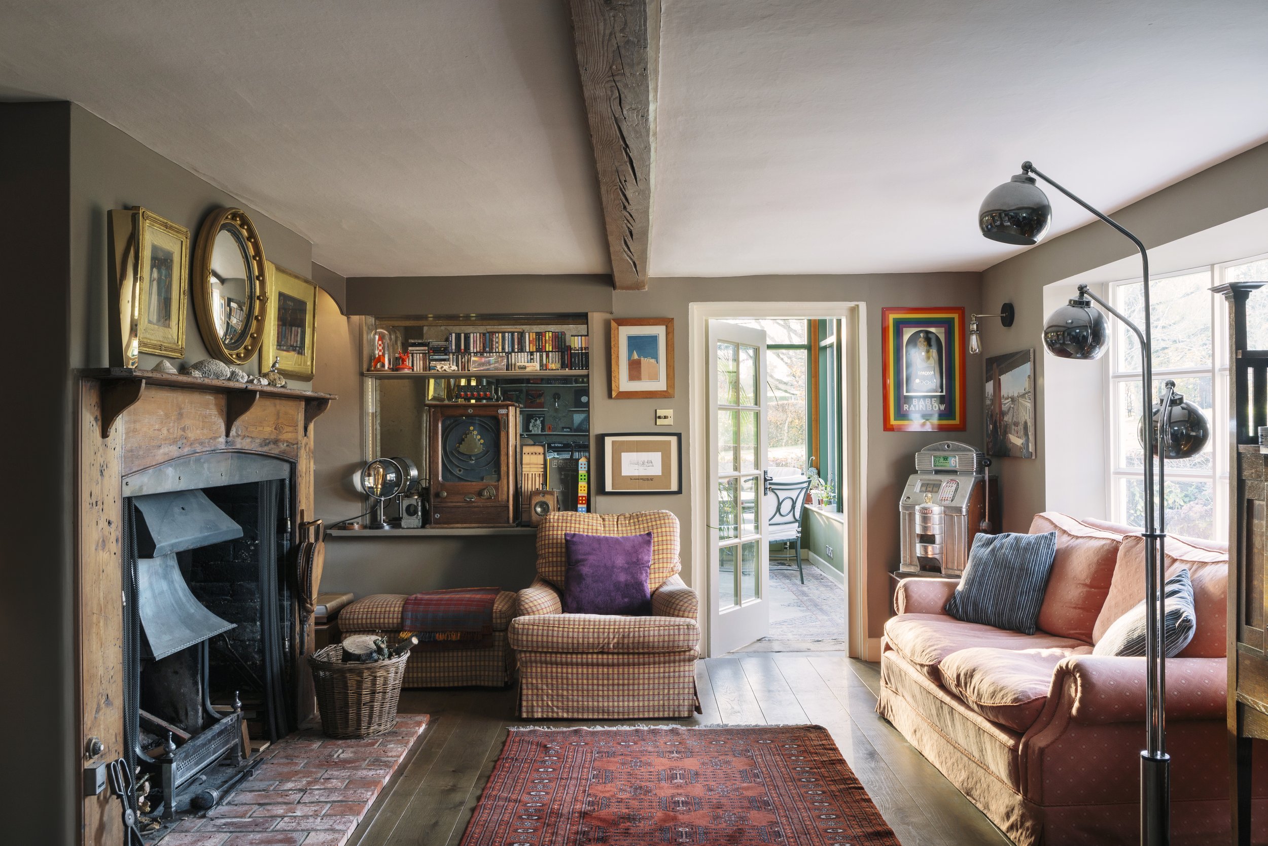 A UK farmhouse renovation project designed to respond to rolling hills, farmland, and surrounding rural landscape.