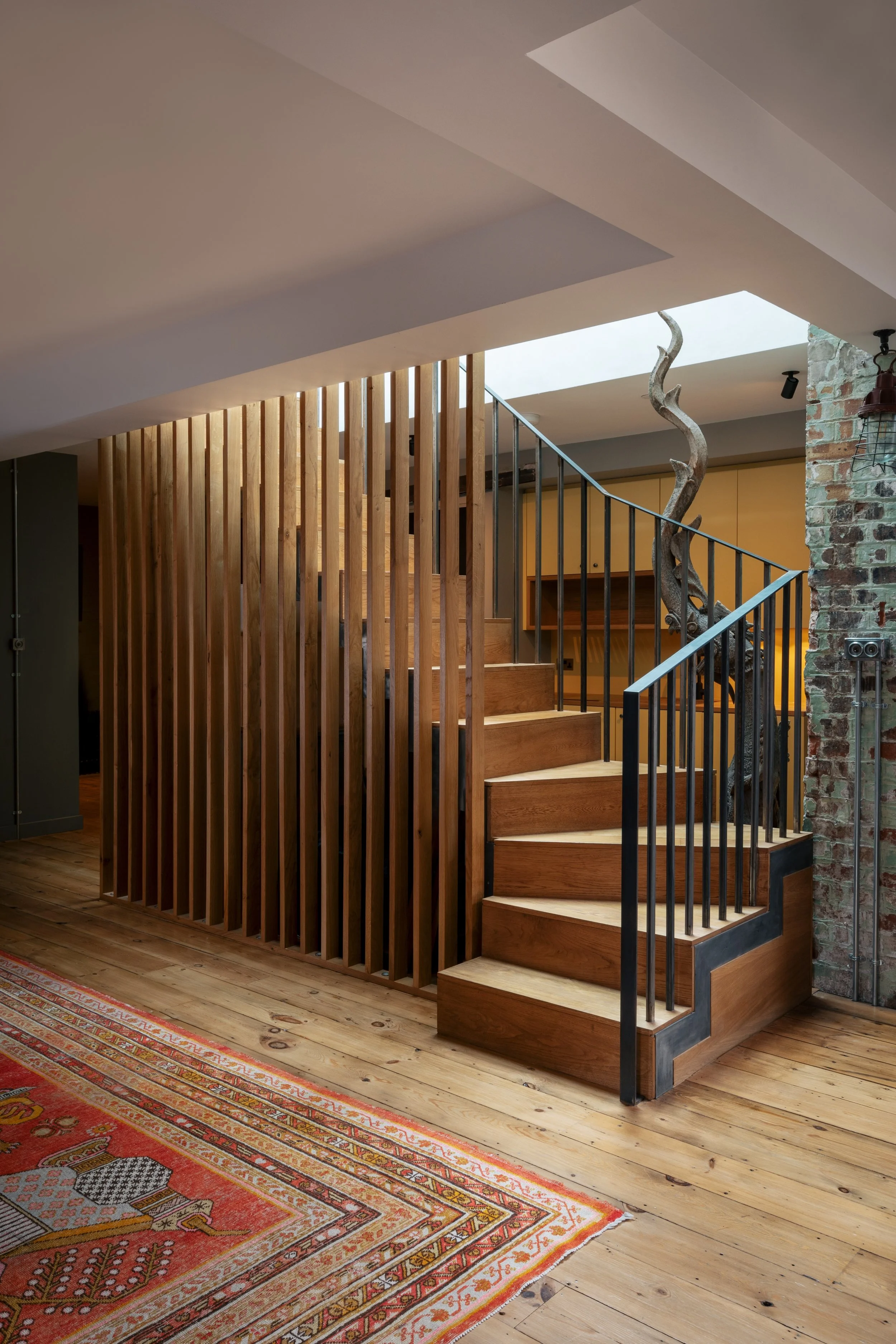 Staircase renovation detail by Studio Tashima within a London property reflecting architecture services and careful residential design