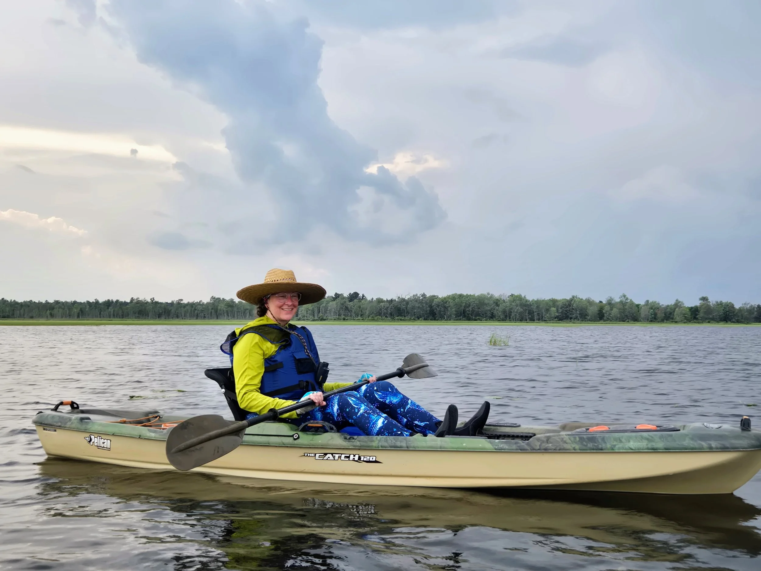 Sarah Waters enjoyed her first time seeing wild rice in person during Tawas Lake Day.