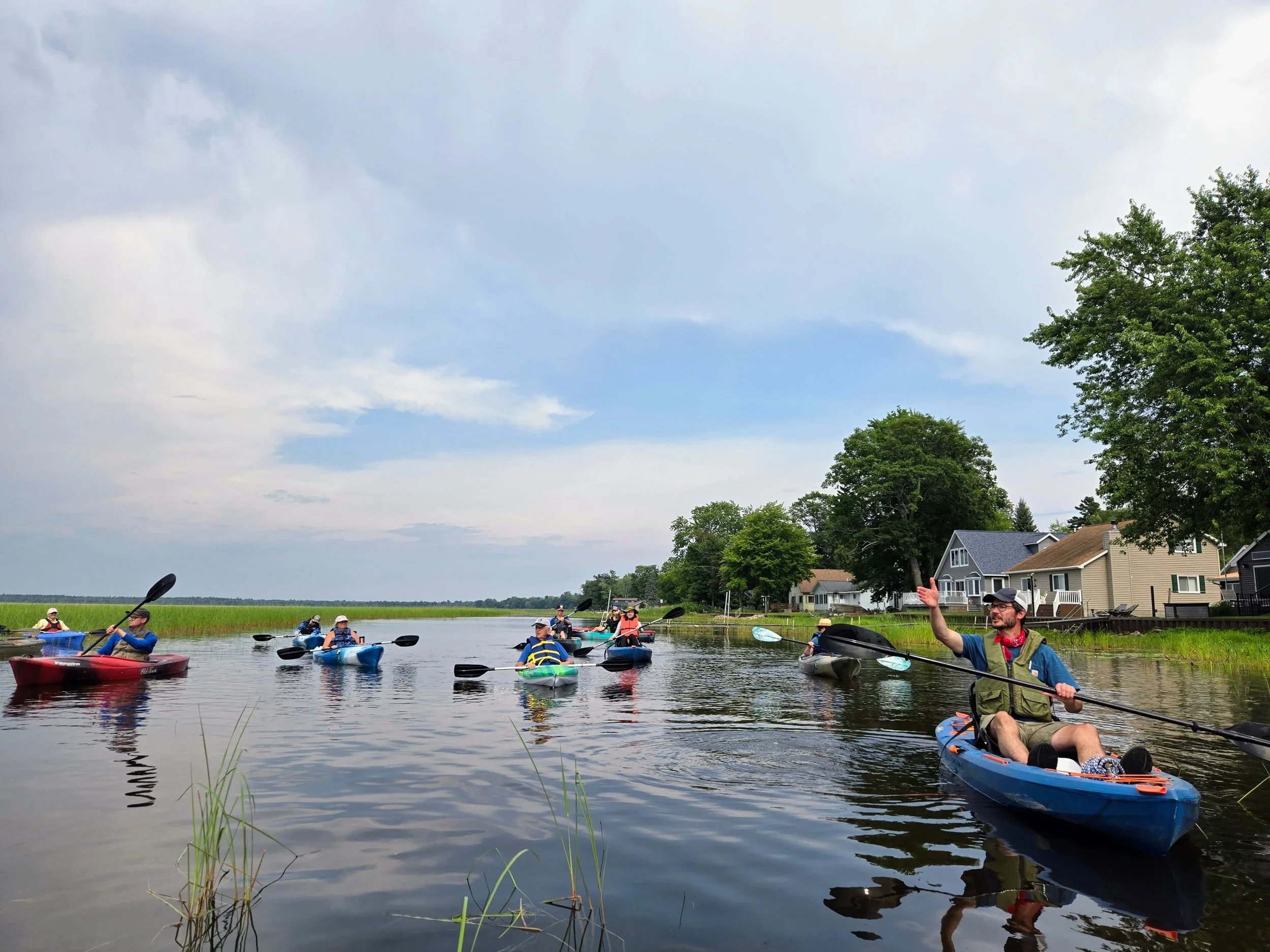 Participants begin their paddle during Tawas Lake Day.