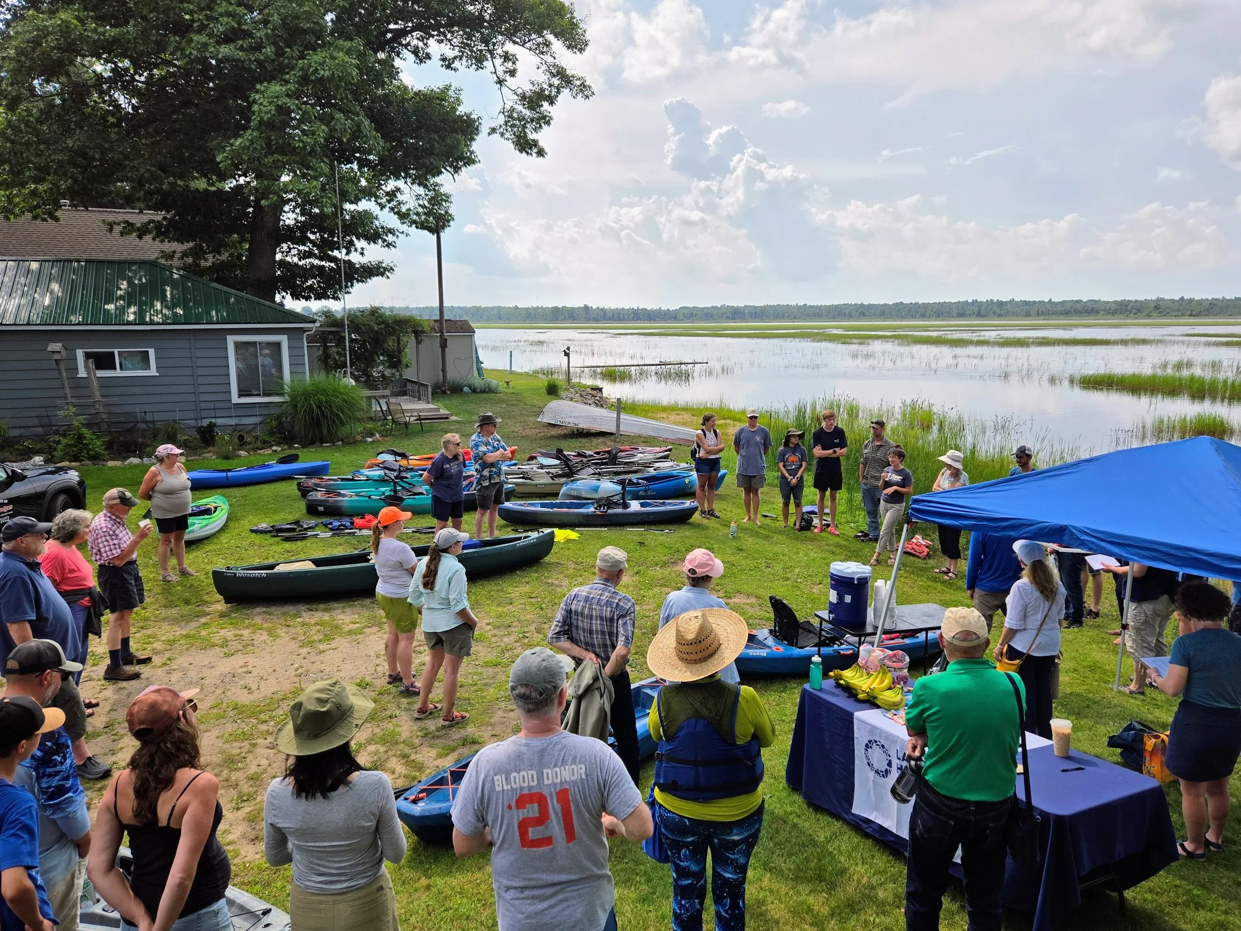 Participants gather at the public access site for Tawas Lake Day.