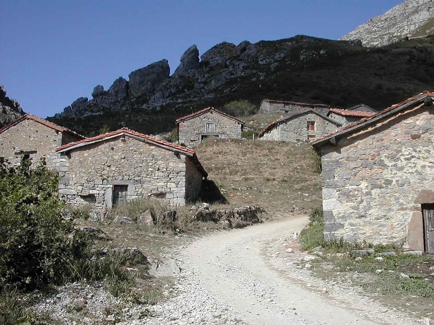 A series of stone shepherd huts on a hillside in north Spain,
