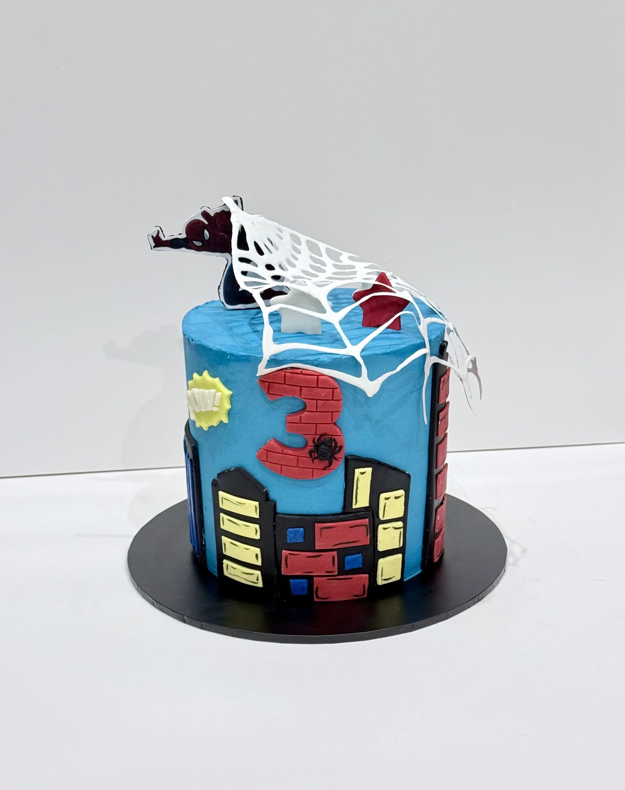 Spiderman webb cake.jpeg