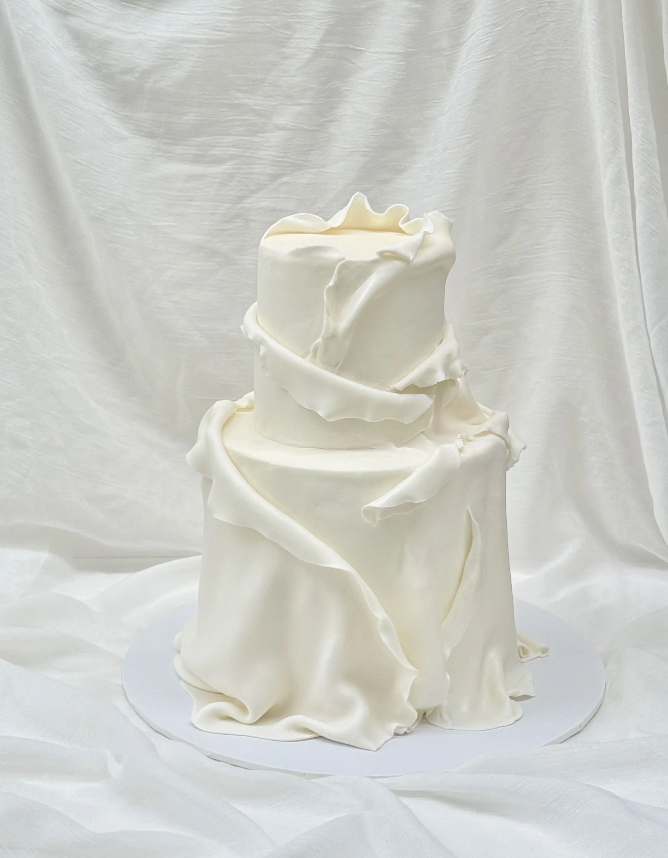 fondant drape wedding cake.jpeg