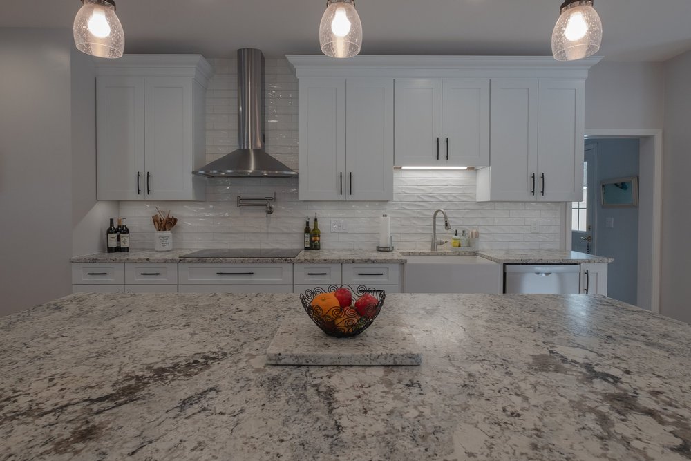 round-lake-remodeling-white-cobblestone-island-kitchen-8.jpg