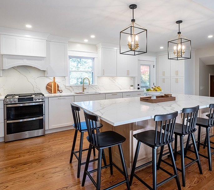 We love it when homeowners come to us with big ideas. This Hanover Colonial was built in 1973 by the well-known Robert Van Patten. The kitchen was a true 1970s time capsule, with its dated original cabinets, laminate countertops, poor lighting, bulky
