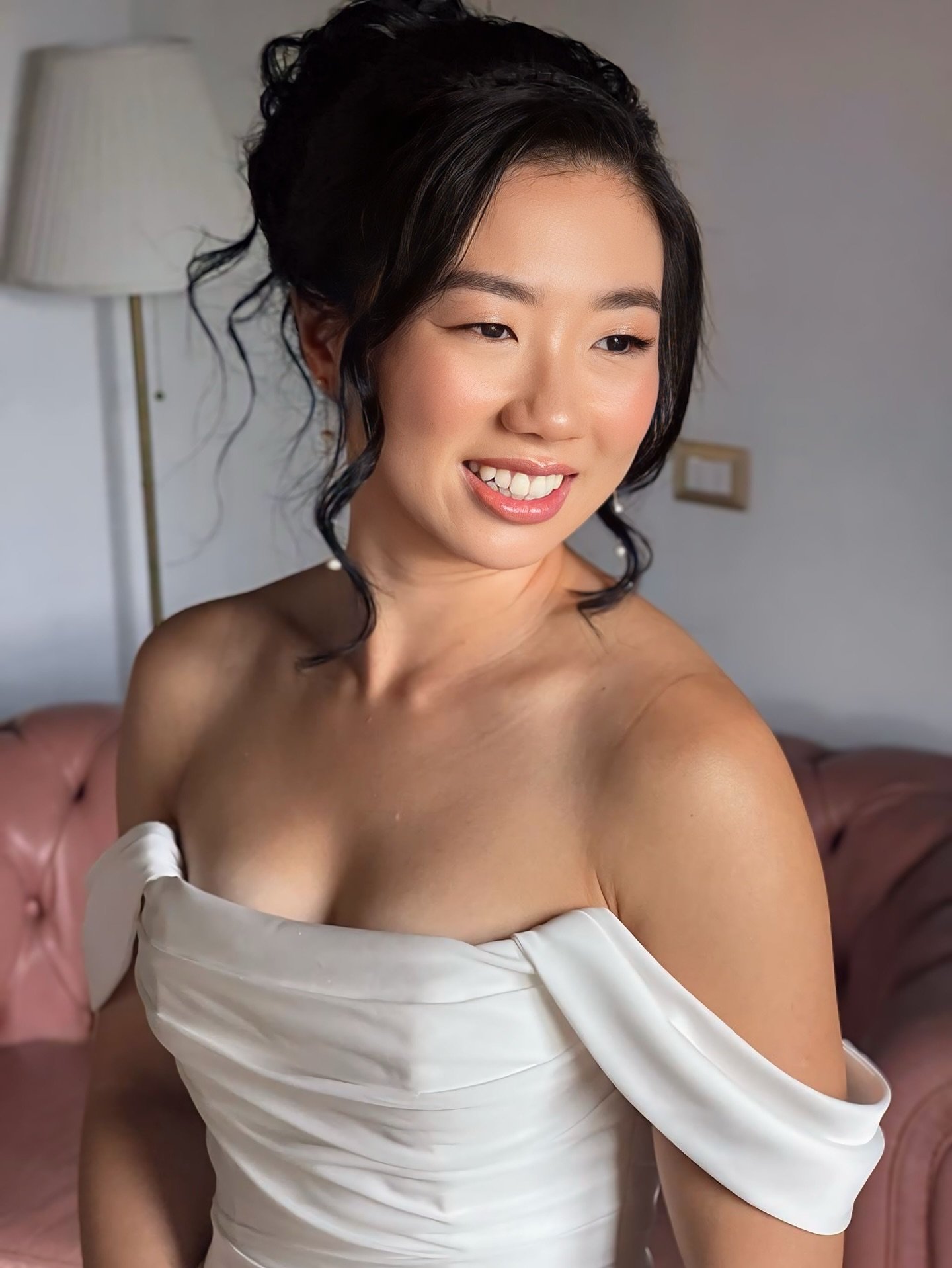 An ethereal beauty at Villa le Bolli 🤍 Amy&rsquo;s wedding morning was filled with elegance, softness, and the sweetest glow. I created a romantic updo with delicate face-framing curls paired with a luminous, timeless makeup look that enhanced her n