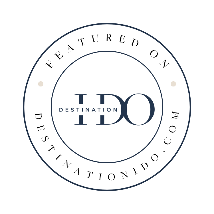 A black circular logo with blue concentric rings, featuring the words "TD DESTINATION" in the center, with "TD" being larger and "DESTINATION" in smaller font underneath.