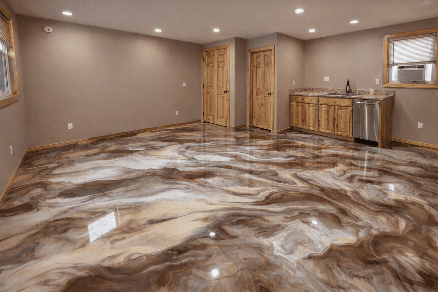 Room with shiny, marbled brown and white floors, beige walls, wooden trim, two windows, and a small kitchen area with wooden cabinets, granite countertop, and a window air conditioner.