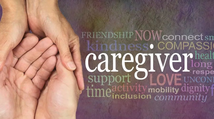 Word cloud with caregiver in the center and many hands holding each other