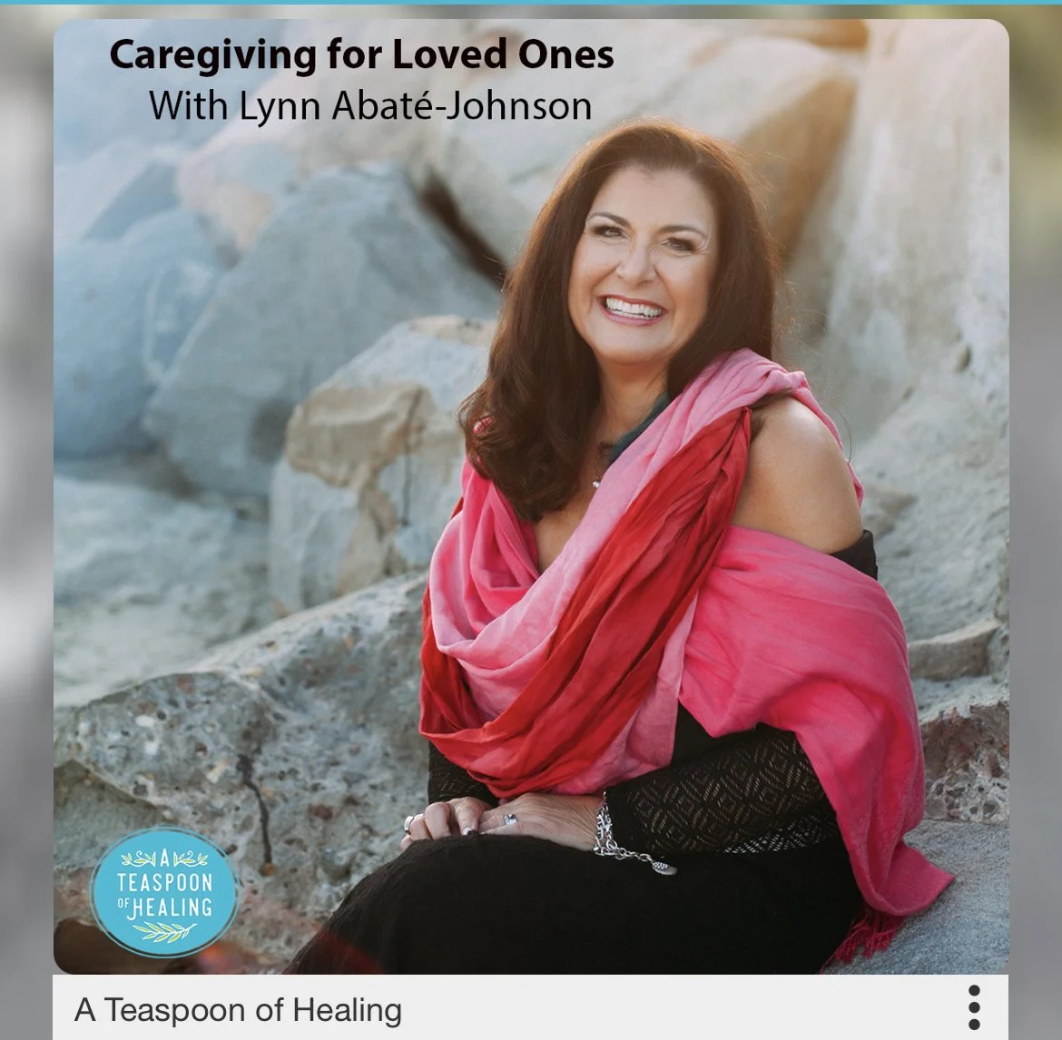 A photo of Lynn sitting down, smiling, with her name and the podcast title, Caregiving For Loved Ones, and A Teaspoon Of Healing on the bottom