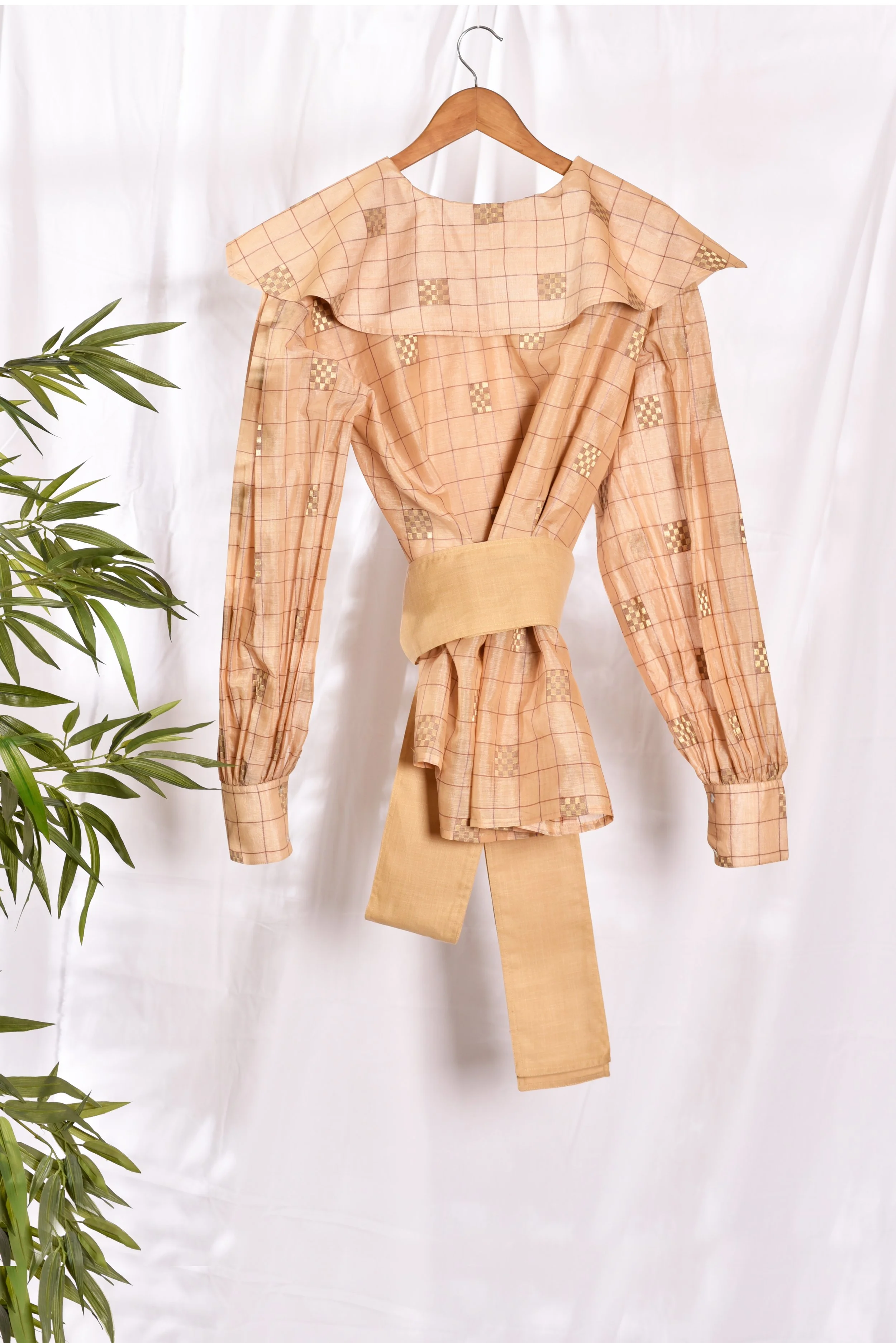 Back view of Annabelle Wrap around blouse with broad tie up obi blt and draped collar