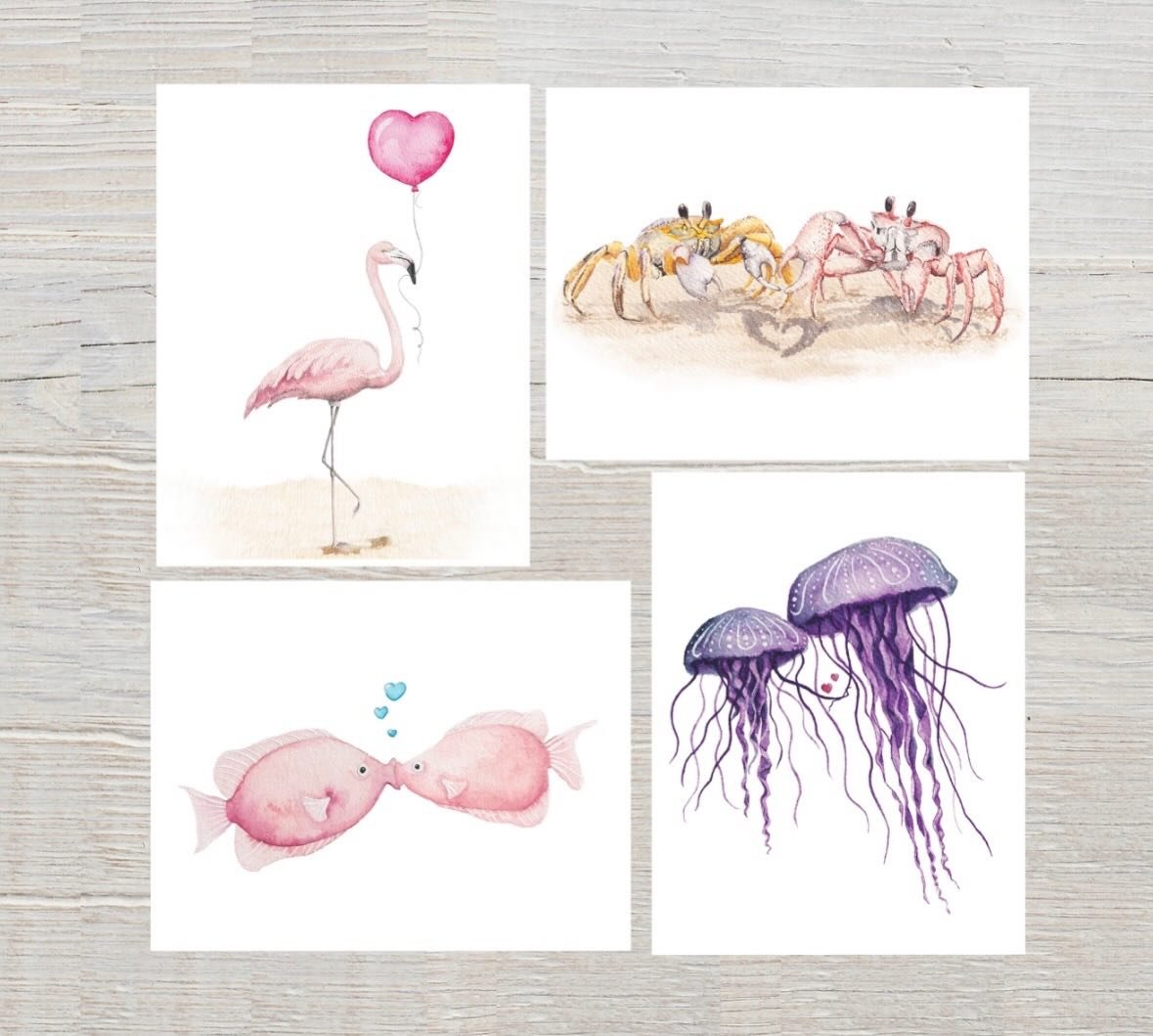 Love is in the air... and under the sea! 🌊💕

Introducing my new Valentine&rsquo;s collection featuring the sweetest beach creatures you ever did see. From kissing fish to dancing crabs, a flamingo with a heart balloon, and a pair of jellyfish float