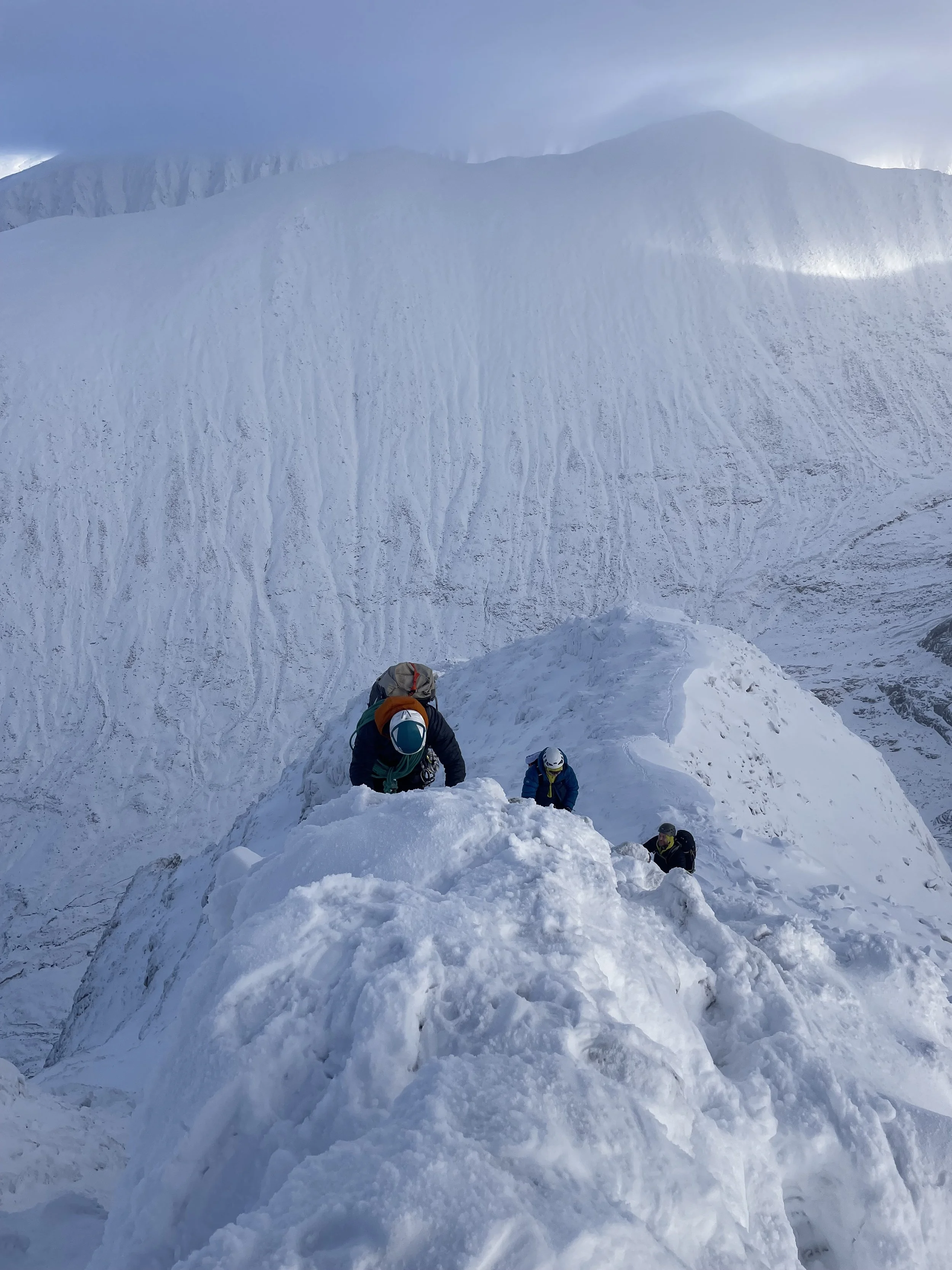 People winter mountaineering in the Cairngorms in Scotland