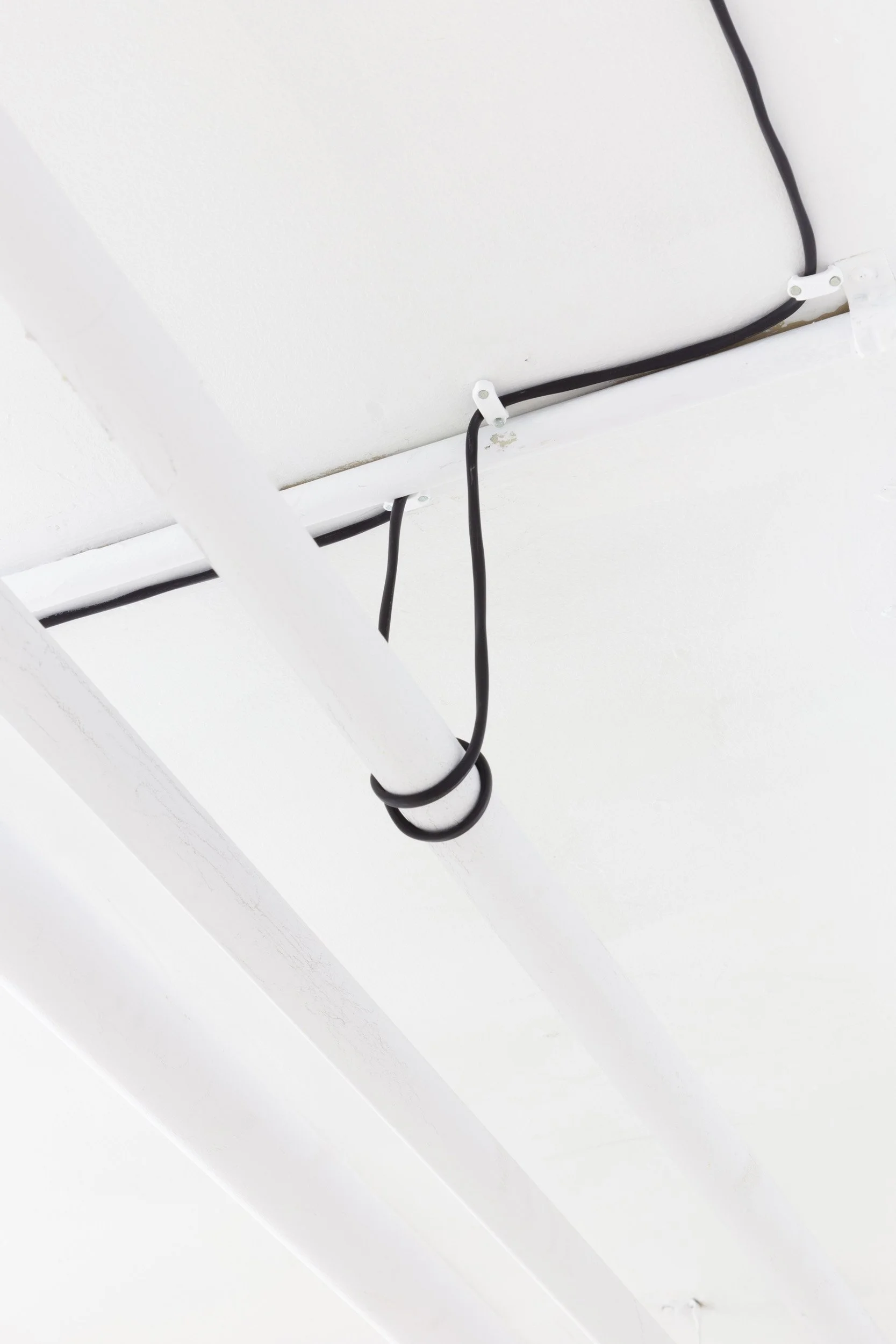 Emily DiCarlo, "Talking Clock Choir", 2022. Four-channel sound installation, PA speakers, modulated talking clock public service announcements every half hour. Dimensions variable.