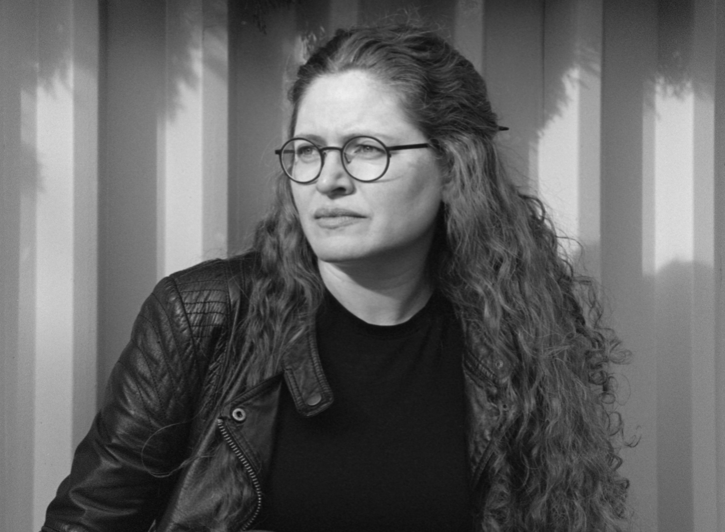 Black and white head shot of Ellen Bleiwas