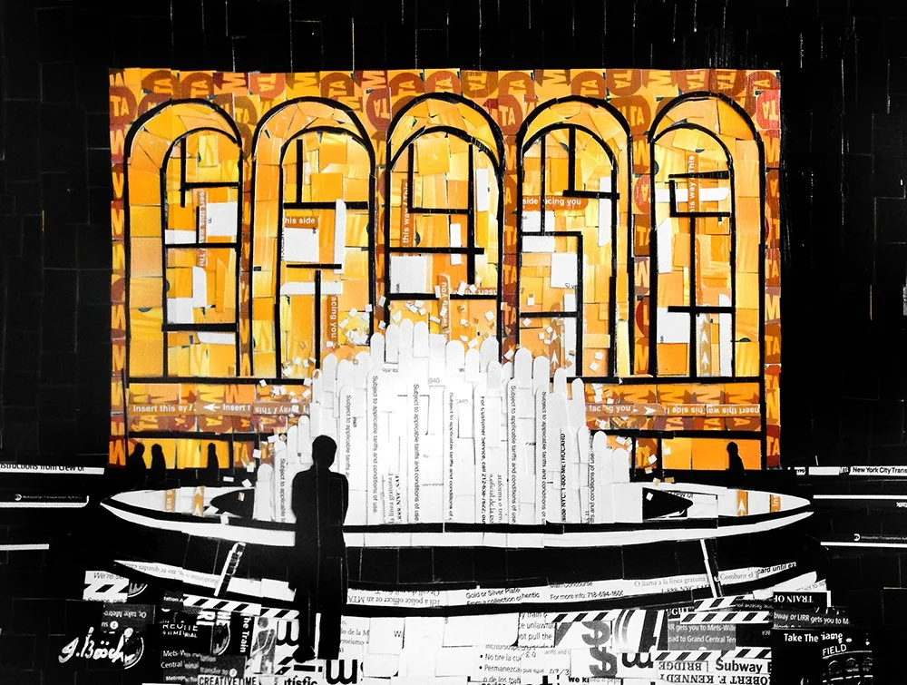 Art installation with large illuminated letters spelling 'IDEA' in orange and yellow, with a silhouette of a person standing in front, surrounded by black-and-white collage elements.