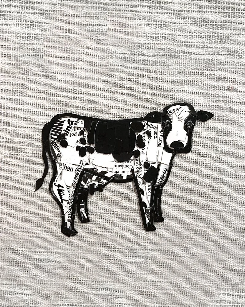 A collage art piece of a dog made from cut-out newspaper and magazine pieces, assembled to resemble a black and white dog on a textured background.