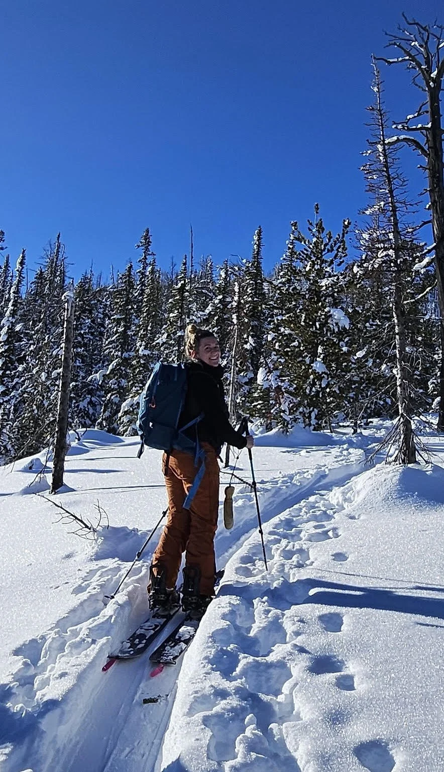 Taylor splitboarding in the trees