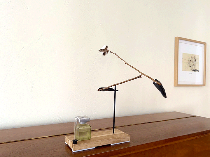 Art project: a double-pendulum mobile whose sequential axes lead to chaotic, unpredictable motion.