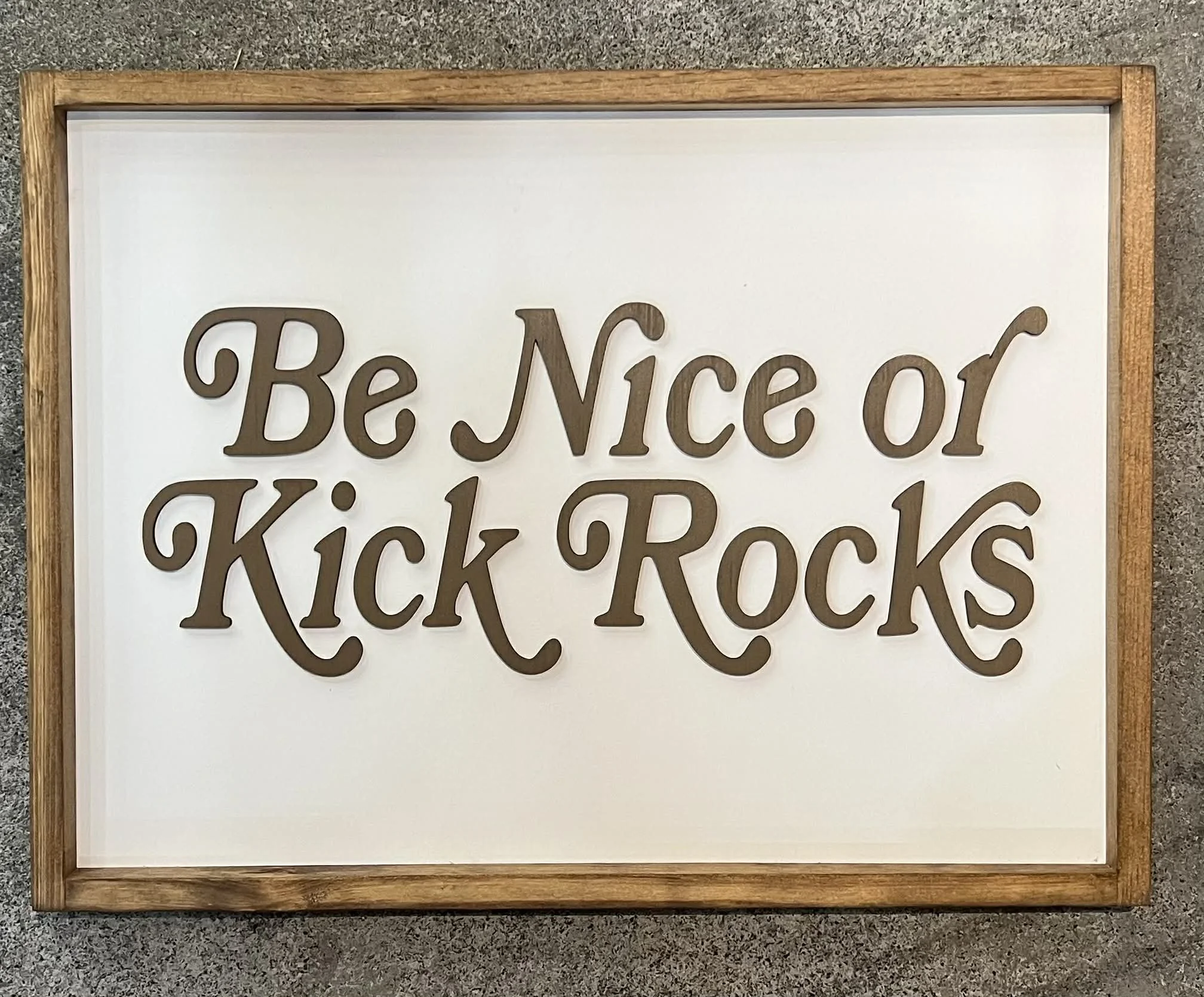 'Be Nice or Kick Rocks' Wooden Wall Sign