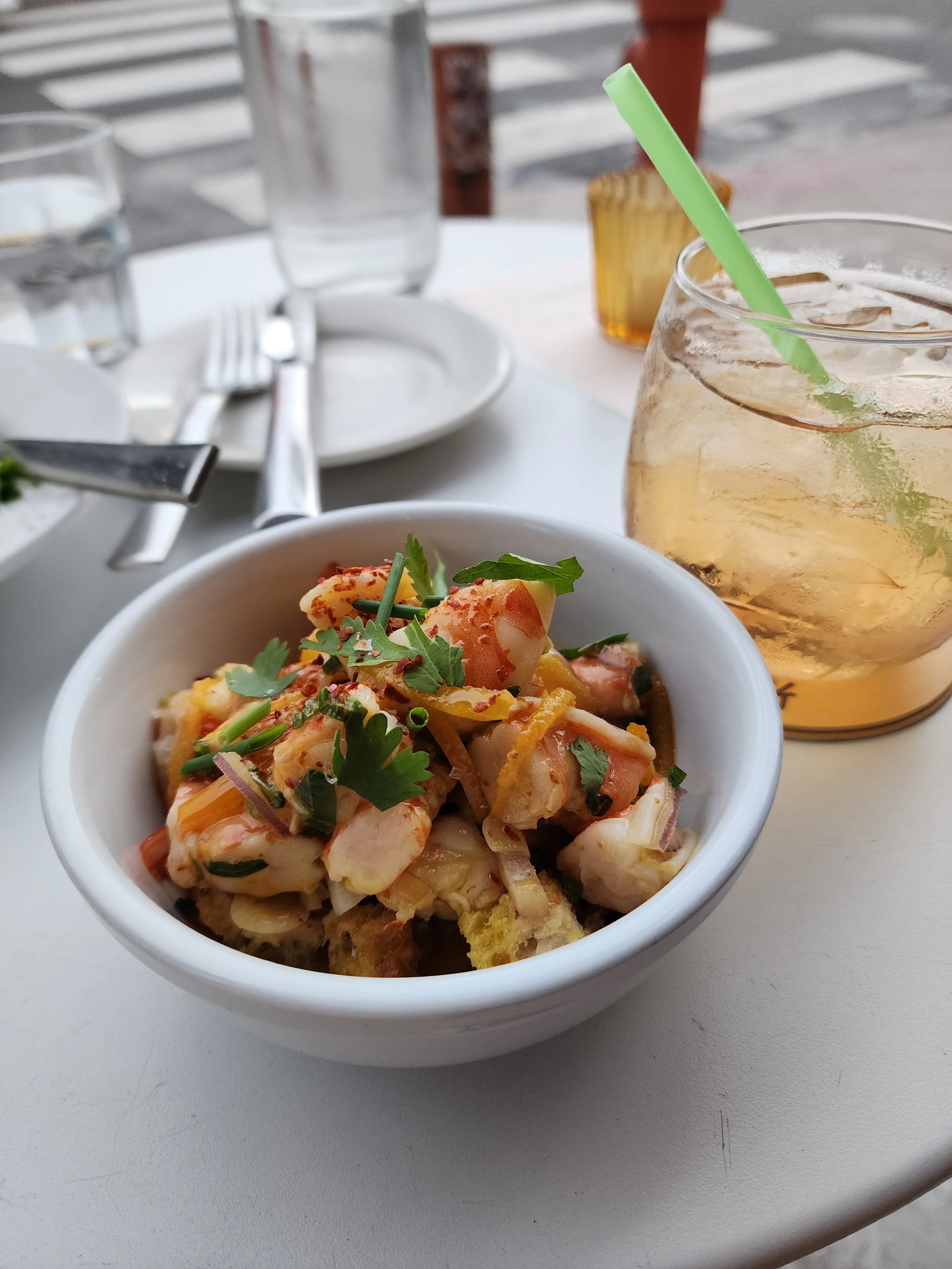 A Bowl of Chilled Shrimp Marinated in Saffron &amp; Citrus with Fresh Herbs &amp; Soaked Croutons